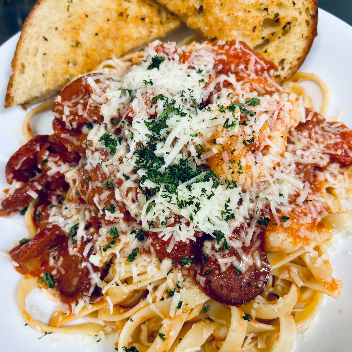 TC's Pub has recently updated our menu to include some NEW items like our chorizo, chicken &amp; prawn fettuccine, tossed in a tomato sauce. We've also added our chicken crunch wrap &mdash;  chicken, cheese, lettuce, tomato &amp; chipotle mayo, wrapp