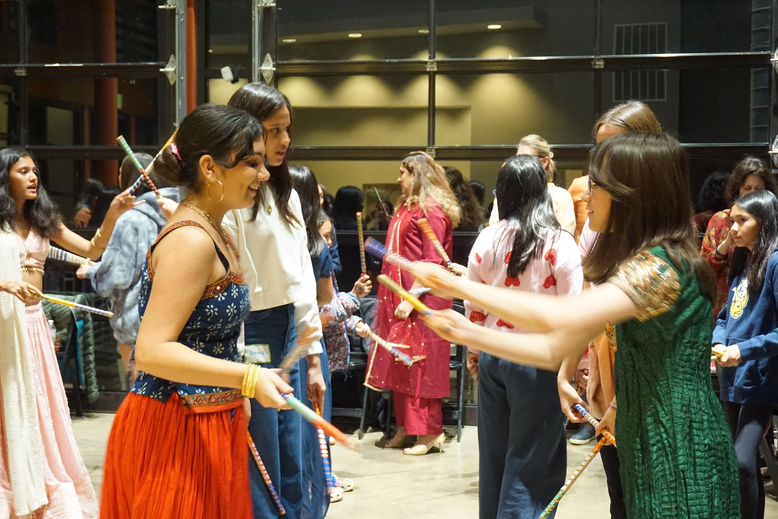  Students and family dance at Central Park Pavilion celebrating AGI Diwali CelebrAsian with Mudra Dance instructor Ninaad 