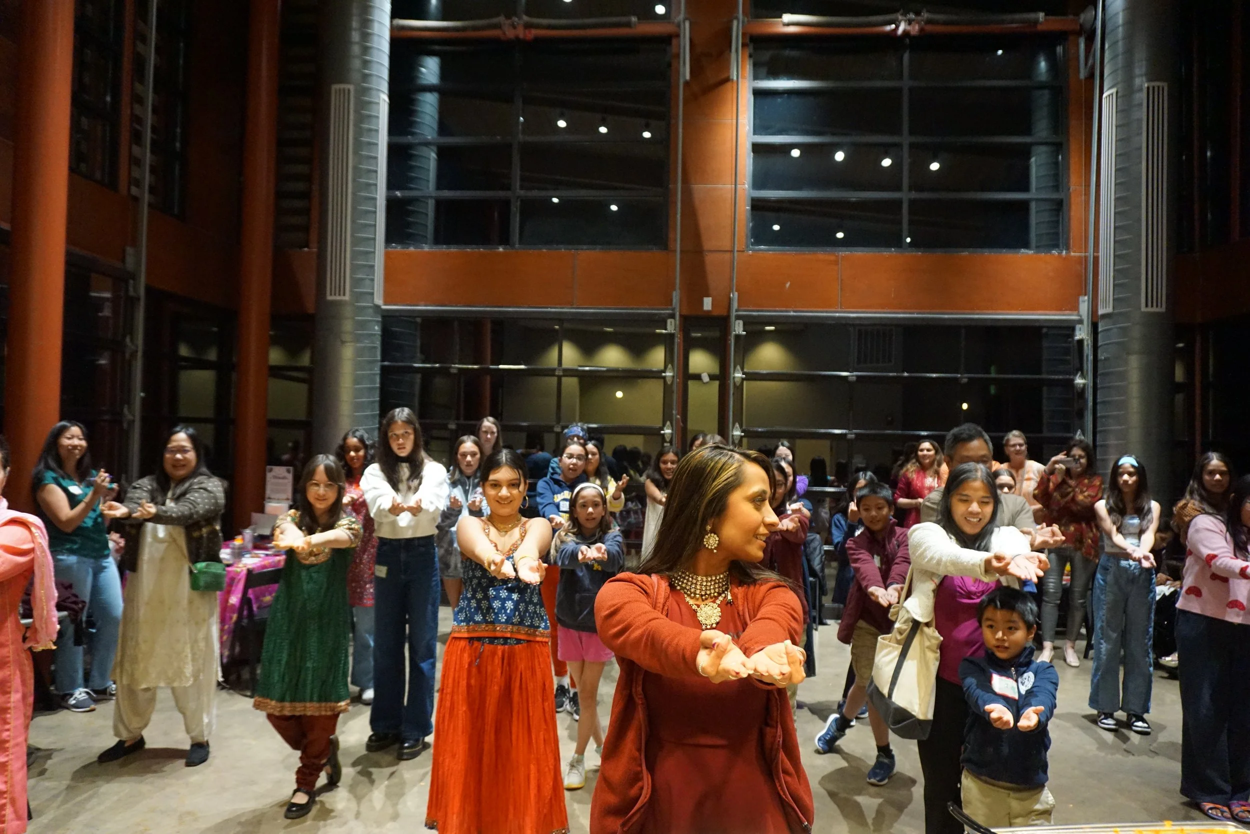  Students and family dance at Central Park Pavilion celebrating AGI Diwali CelebrAsian with Mudra Dance instructor Ninaad 