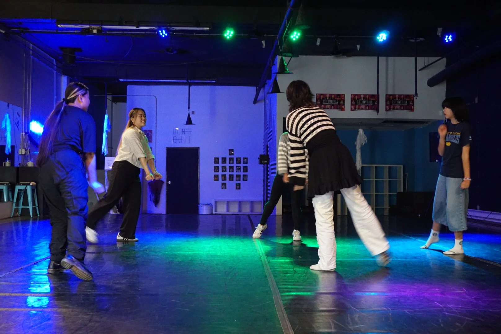  Judy Tran teaching a group of 4 AGI students warm up drills during a dance workshop in Denver, CO 