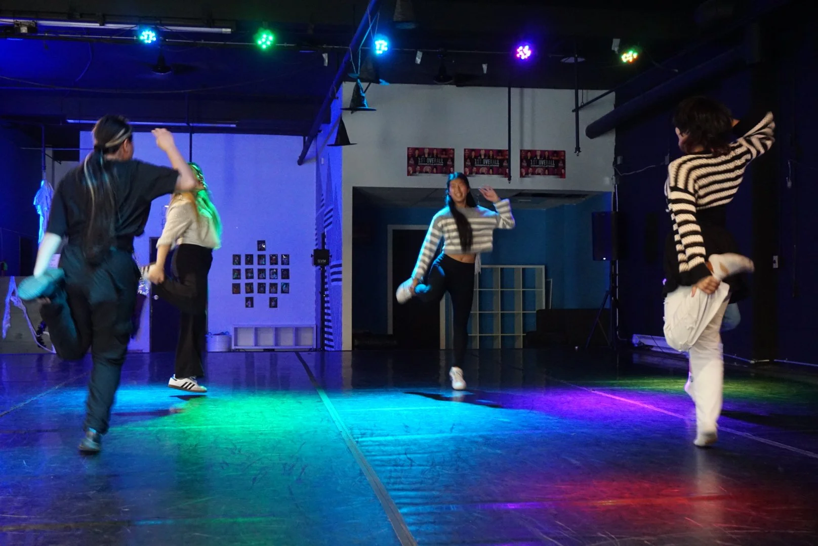  Judy Tran teaching a group of 4 AGI students warm up drills during a dance workshop in Denver, CO 