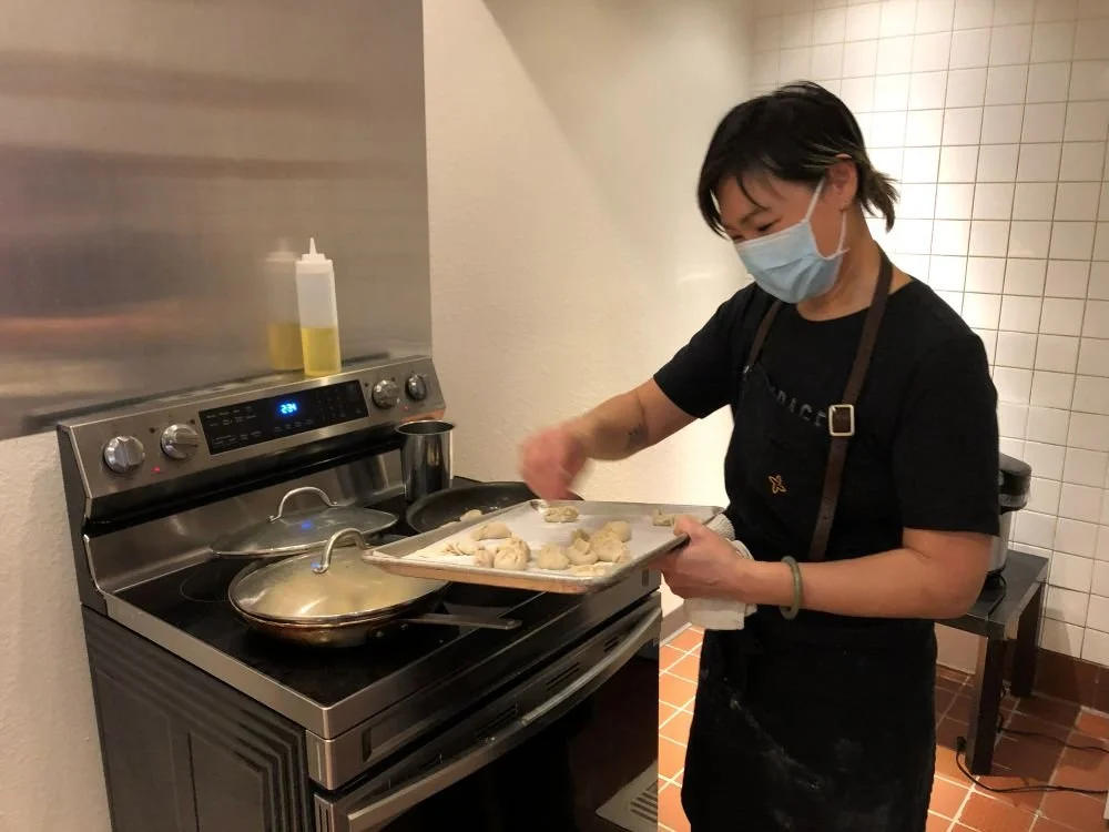 Chef Penelope Wong of Yuan Wonton demonstrating dumpling folding at AGI Dumpling Making Workshop 2022