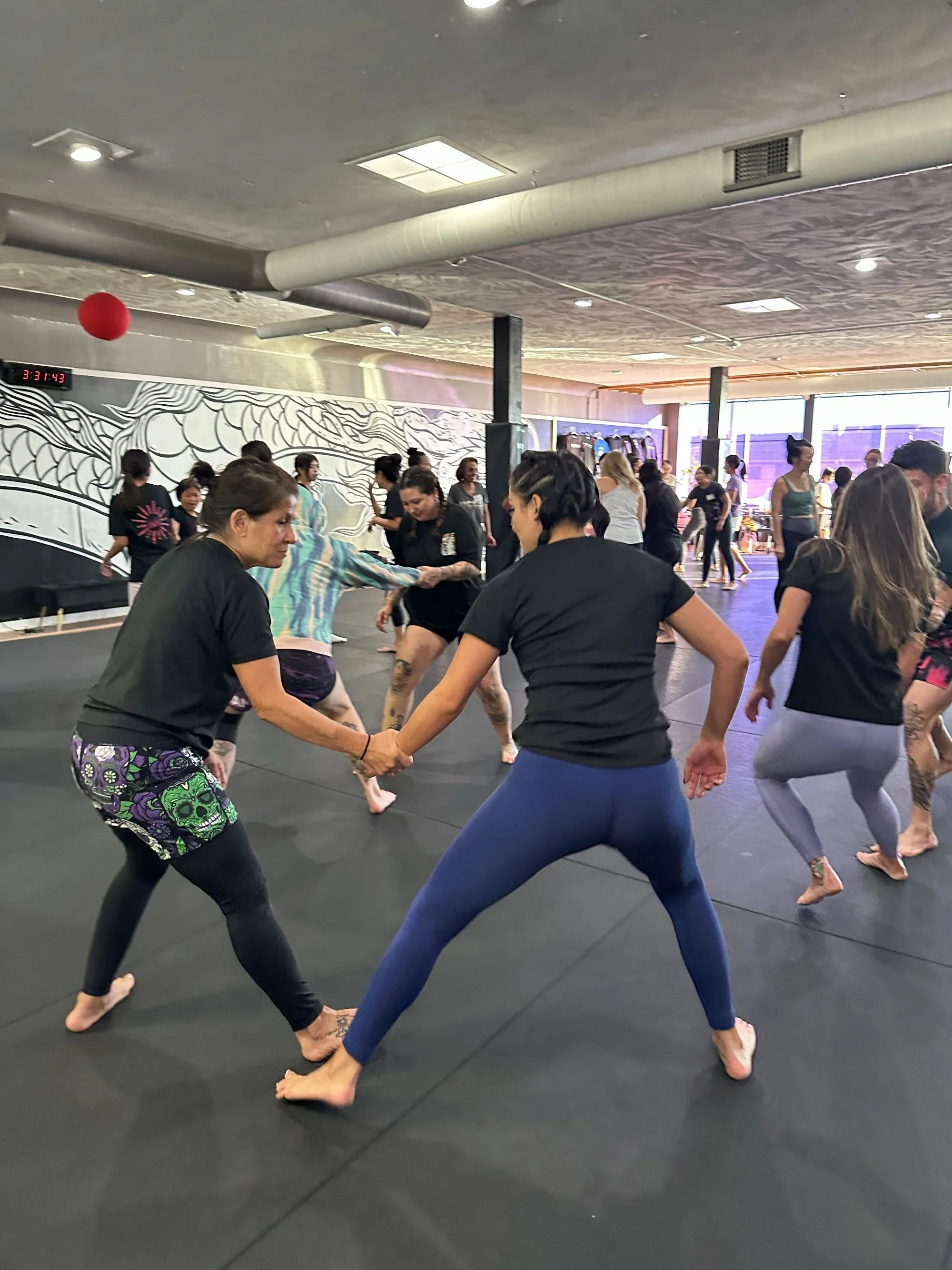  AGI community participating in a self-defense workshop hosted by Imperial Jiu Jitsu &amp; Kickboxing in Lakewood, Colorado 