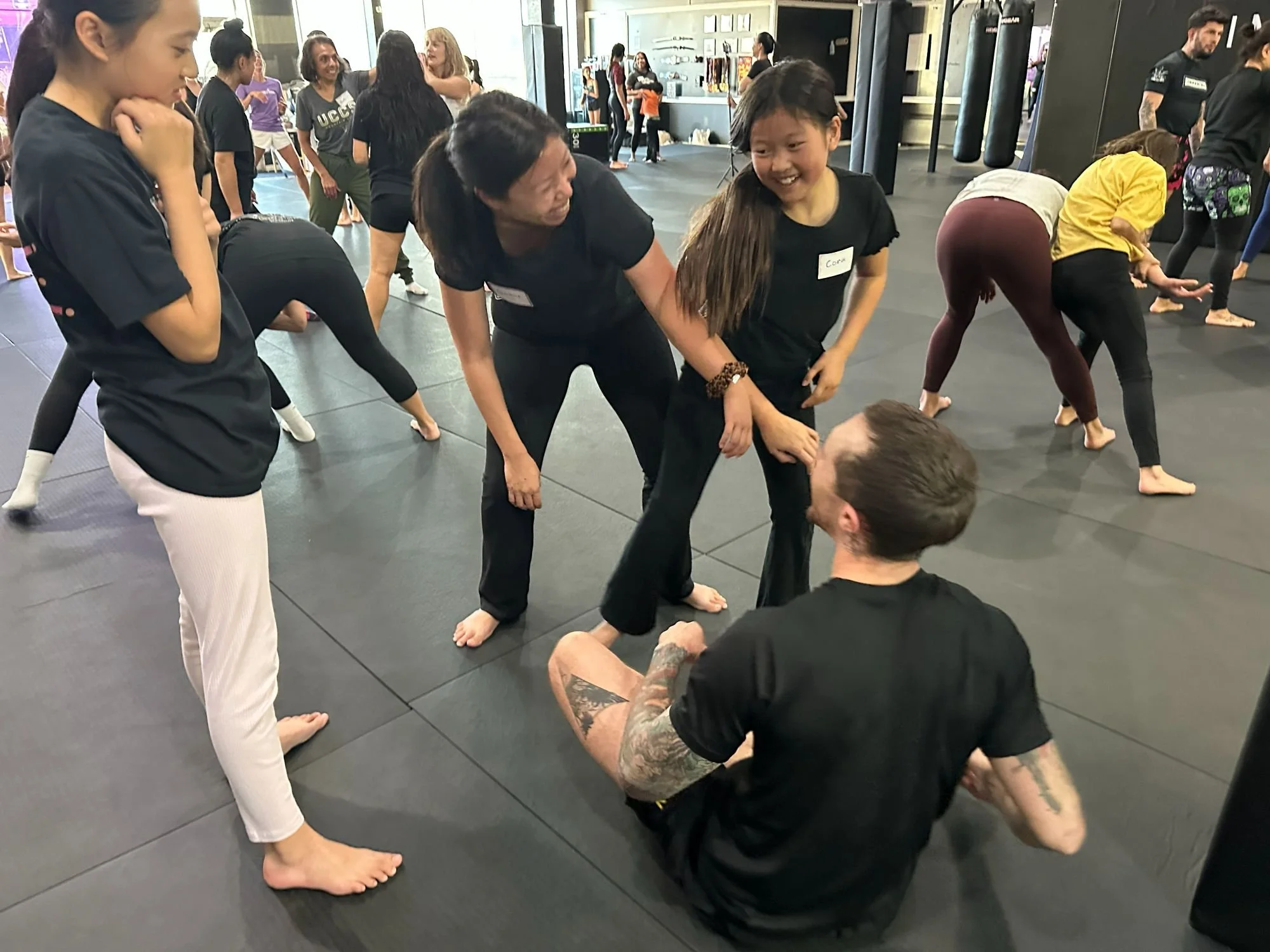  AGI community participating in a self-defense workshop hosted by Imperial Jiu Jitsu &amp; Kickboxing in Lakewood, Colorado 
