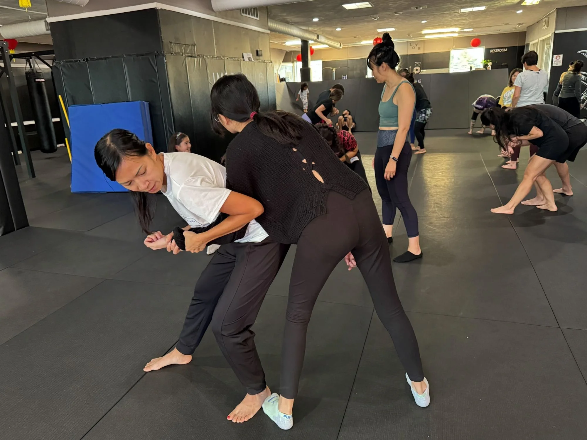  AGI community participating in a self-defense workshop hosted by Imperial Jiu Jitsu &amp; Kickboxing in Lakewood, Colorado 