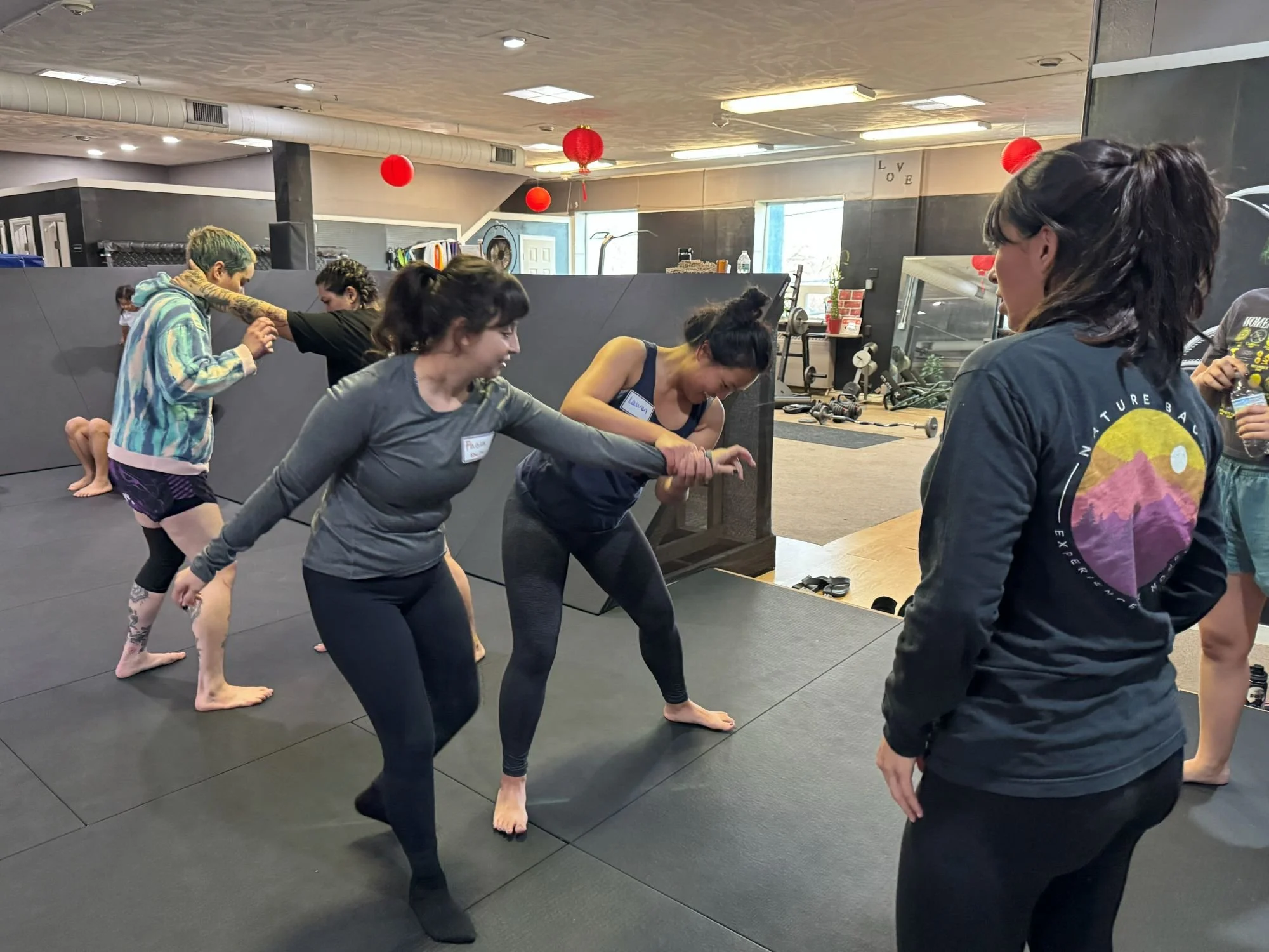  AGI community participating in a self-defense workshop hosted by Imperial Jiu Jitsu &amp; Kickboxing in Lakewood, Colorado 