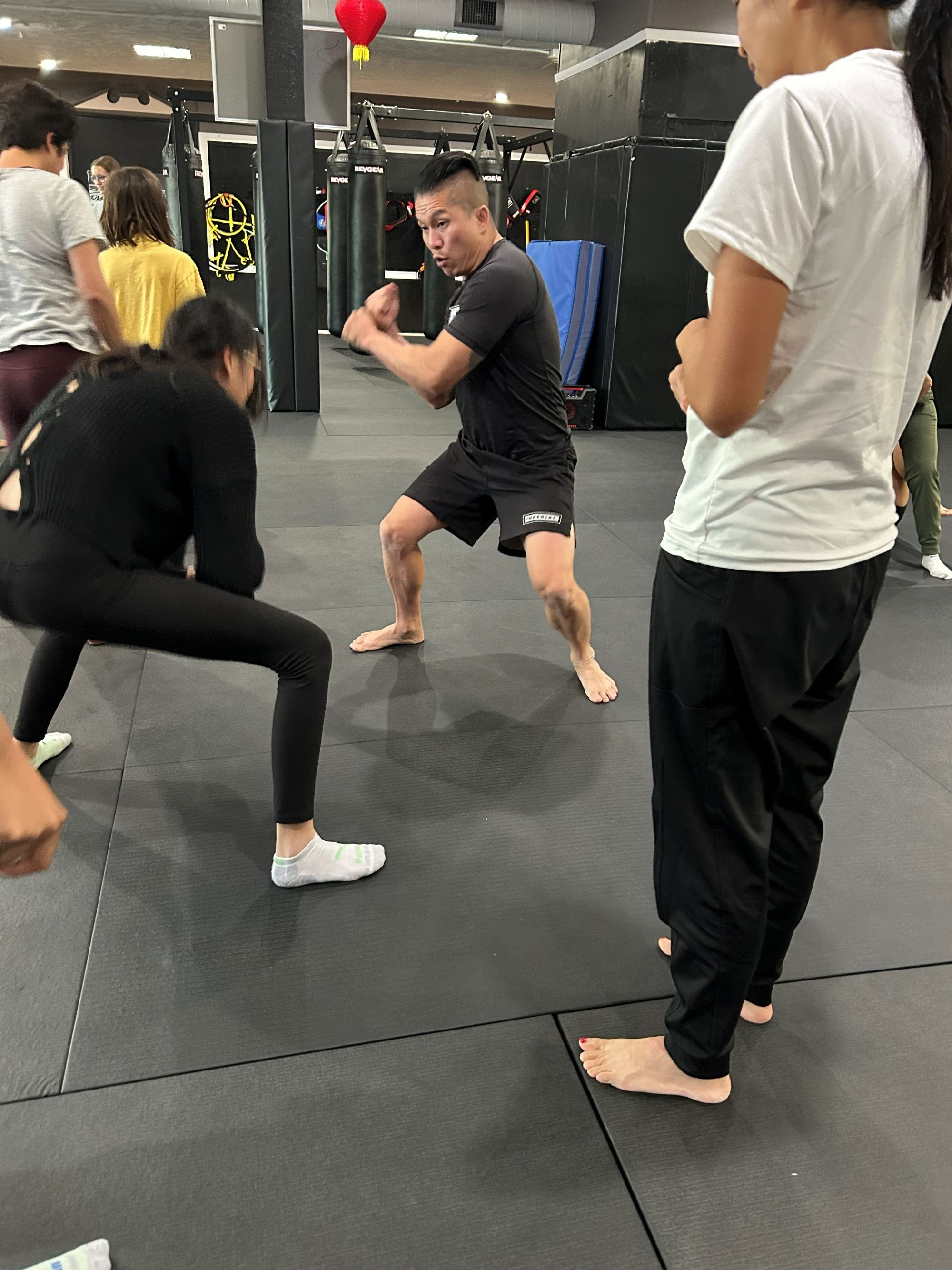  Instructor Duc Dang demonstrates and guides AGI community at self-defense workshop hosted by Imperial Jiu Jitsu &amp; Kickboxing in Lakewood, Colorado 