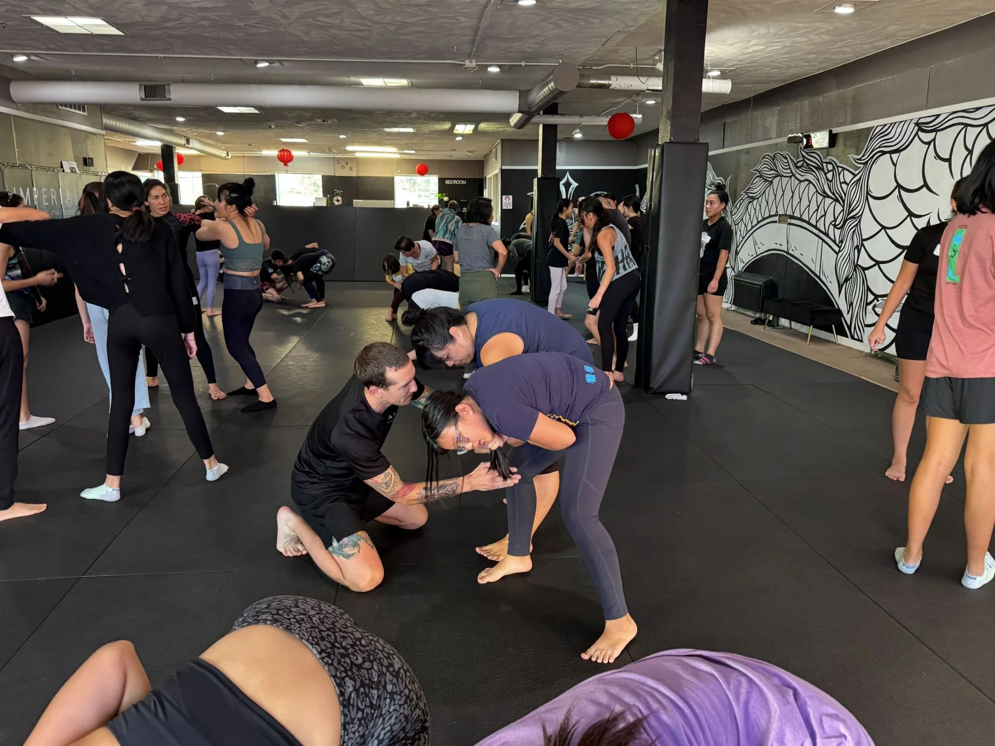  AGI community participating in a self-defense workshop hosted by Imperial Jiu Jitsu &amp; Kickboxing in Lakewood, Colorado 