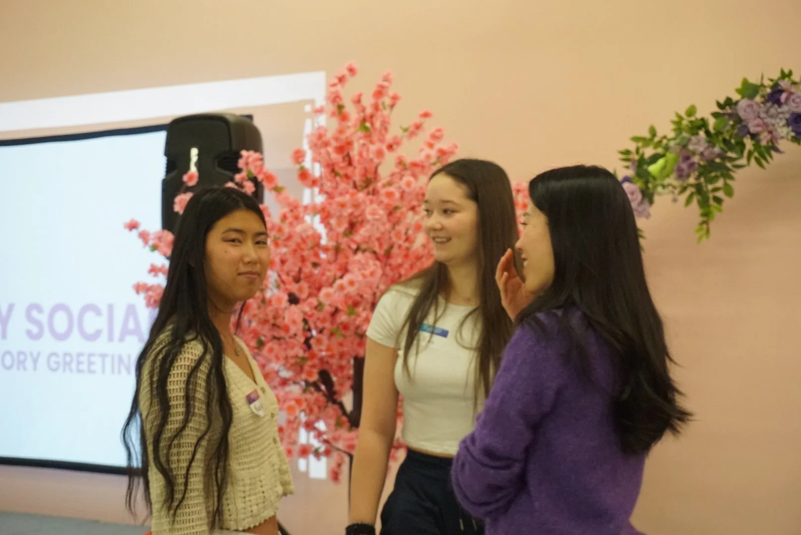  Students in conversation with AGI co-founder Mehgan Yen at AGI Holiday Social 