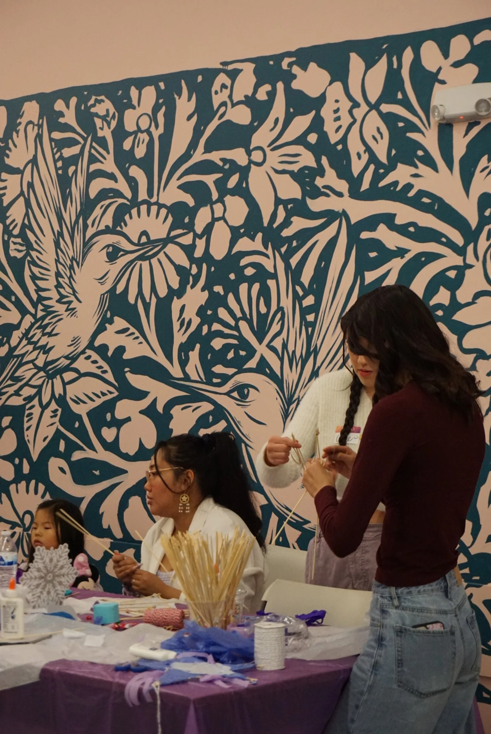  Students and AGI marketing manager, Abigail Regucera at Filipino Parol making table at AGI Holiday Social  