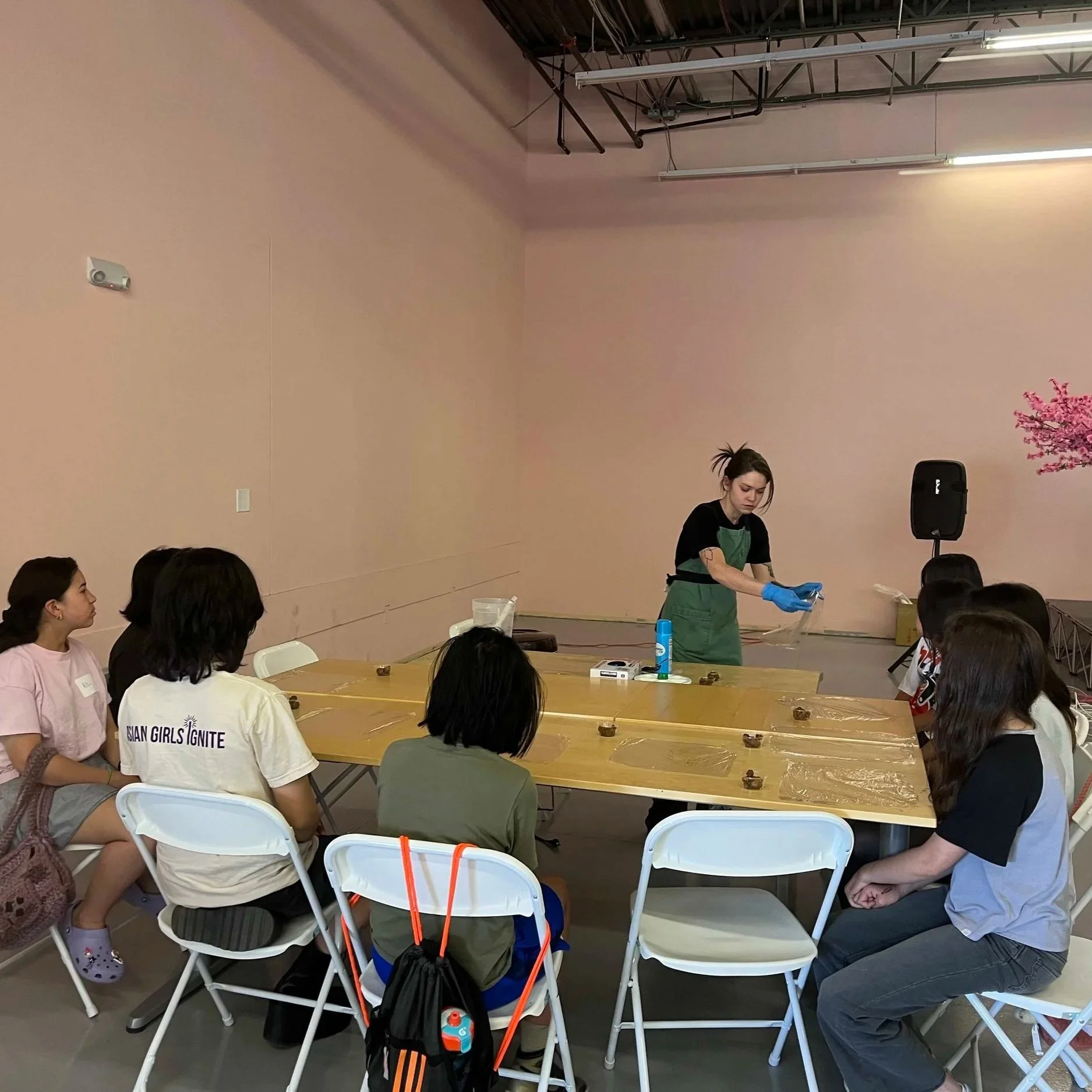 Maddie Dunhoff of Taeko-San Takeout teaching Asian American girls how to make onigiri in Colorado