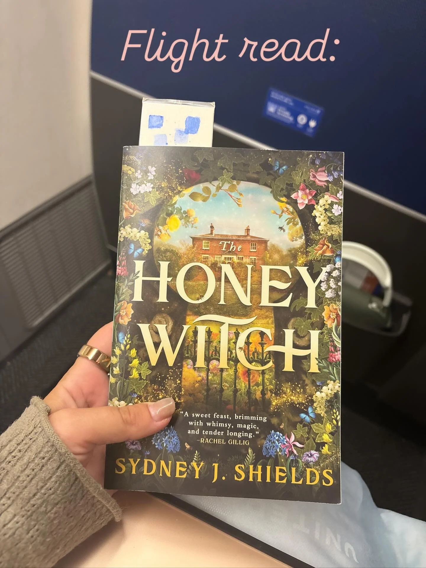Excited to jump into this book by @sydneyjshields !
The perfect cozy novel for a long flight 
#bookstagram #readmore #thehoneywitch #booksbooksbooks
