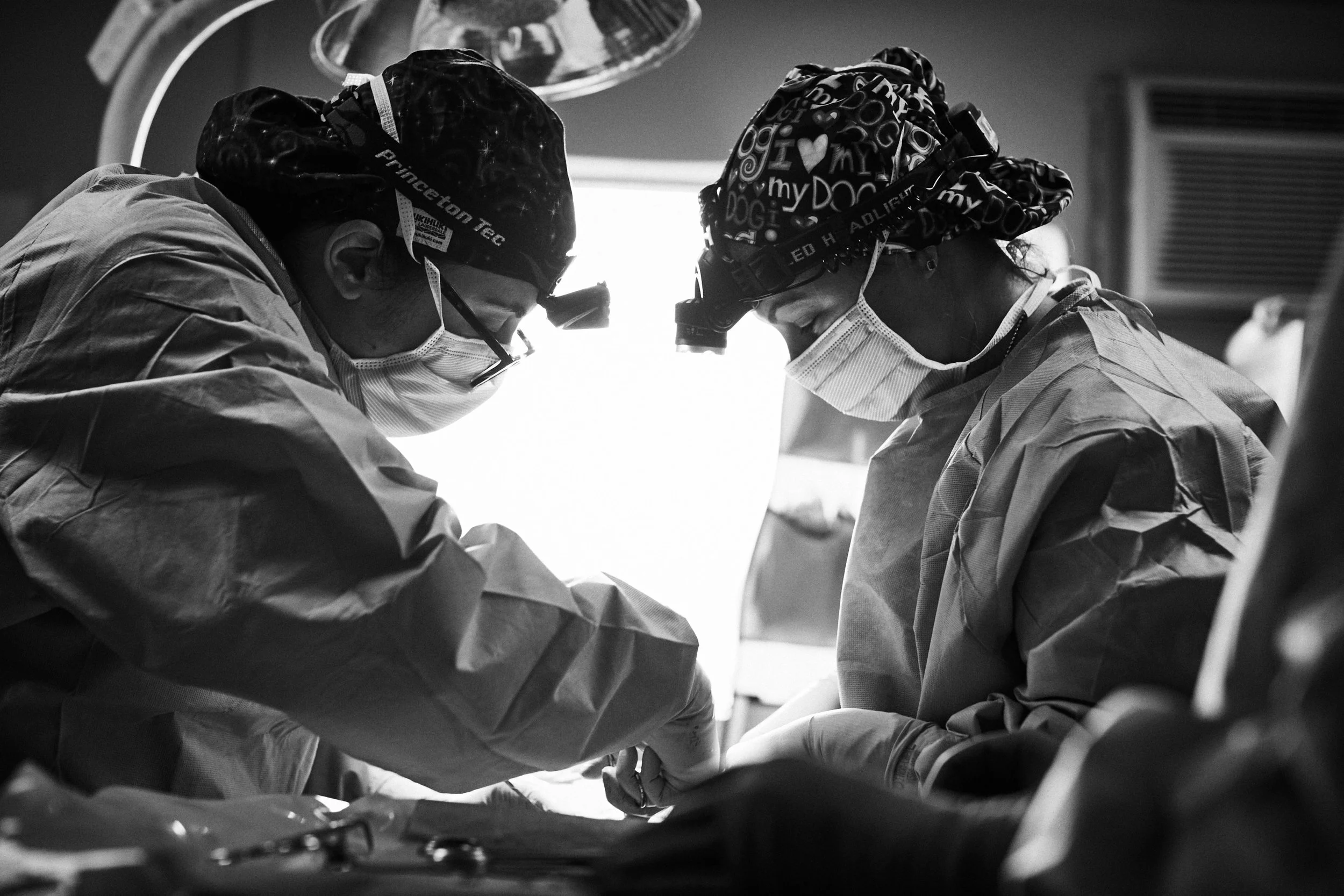 Surgical team in operating room, documentary medical photography