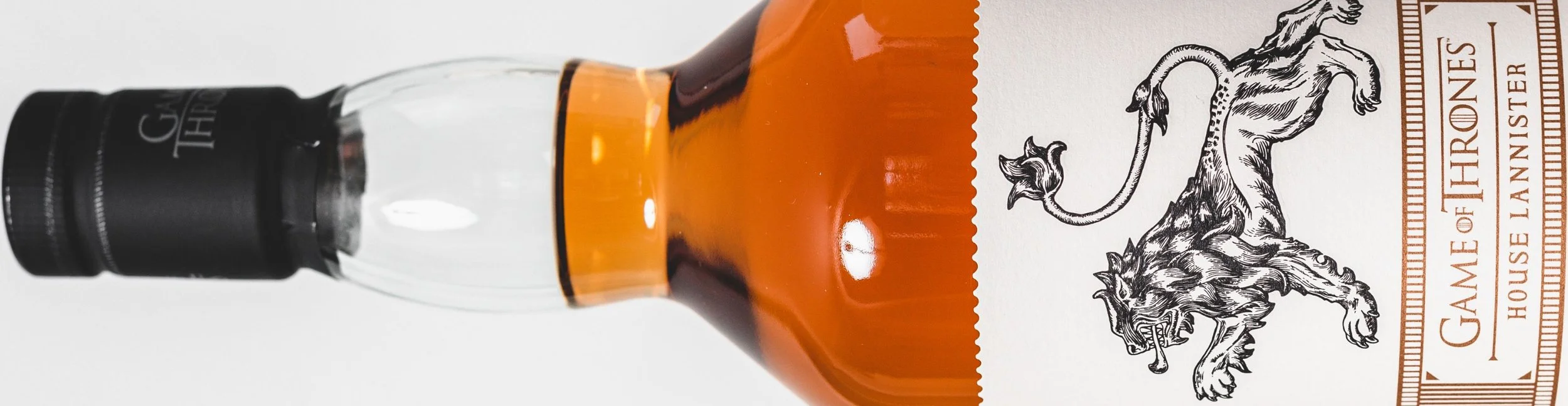 a bottle with branding on it of a liom