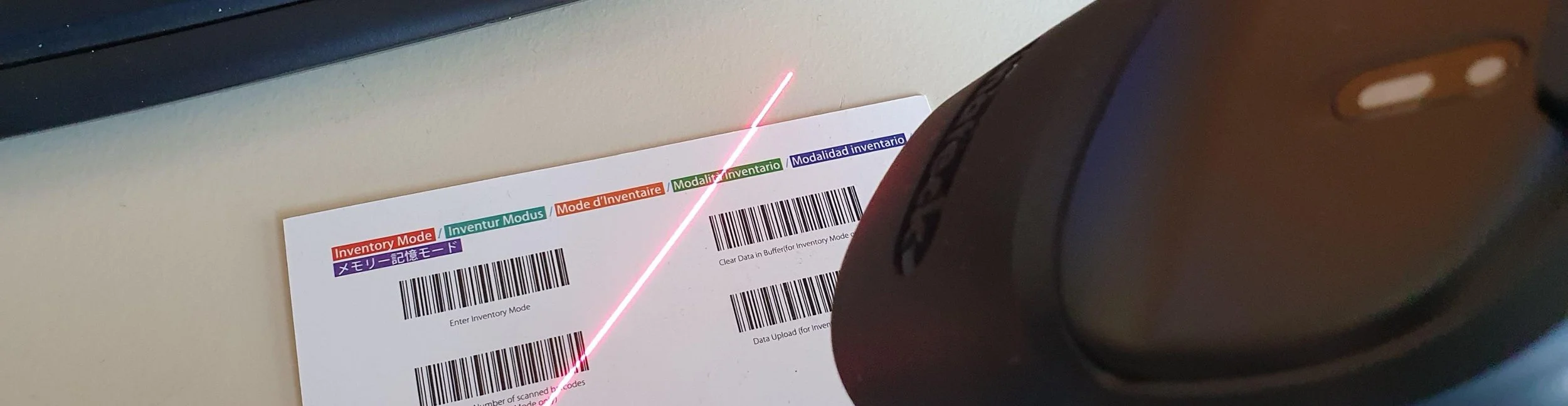 a barcode scanner scanning various barcodes in order to test them