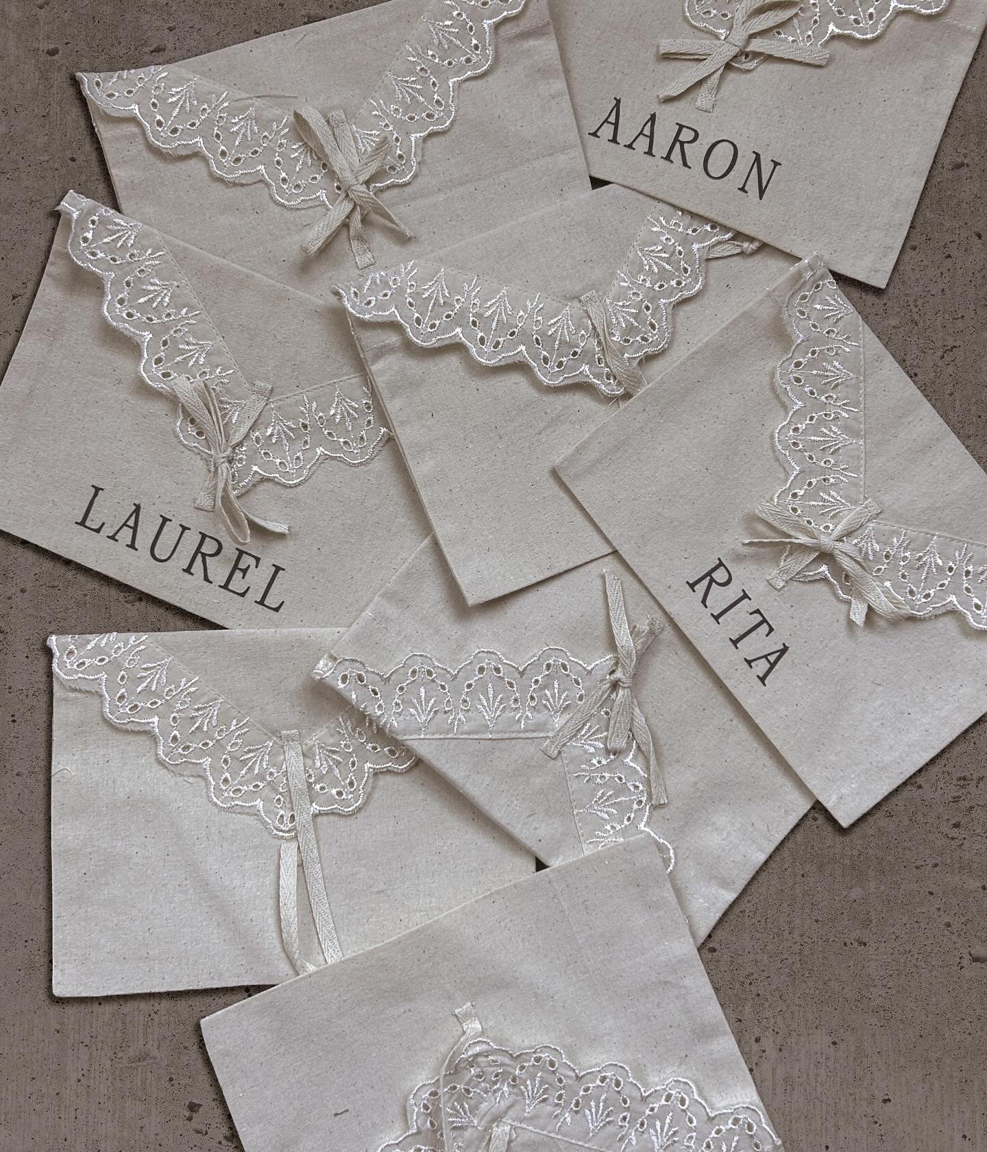 We got to do lots of material exploration for L+As weekend in @amangiri. For their reception dinner we did custom lace-lined envelopes for their place cards with brushed aluminum menus - complementing @wild_heart_events stunning brutalist chic design