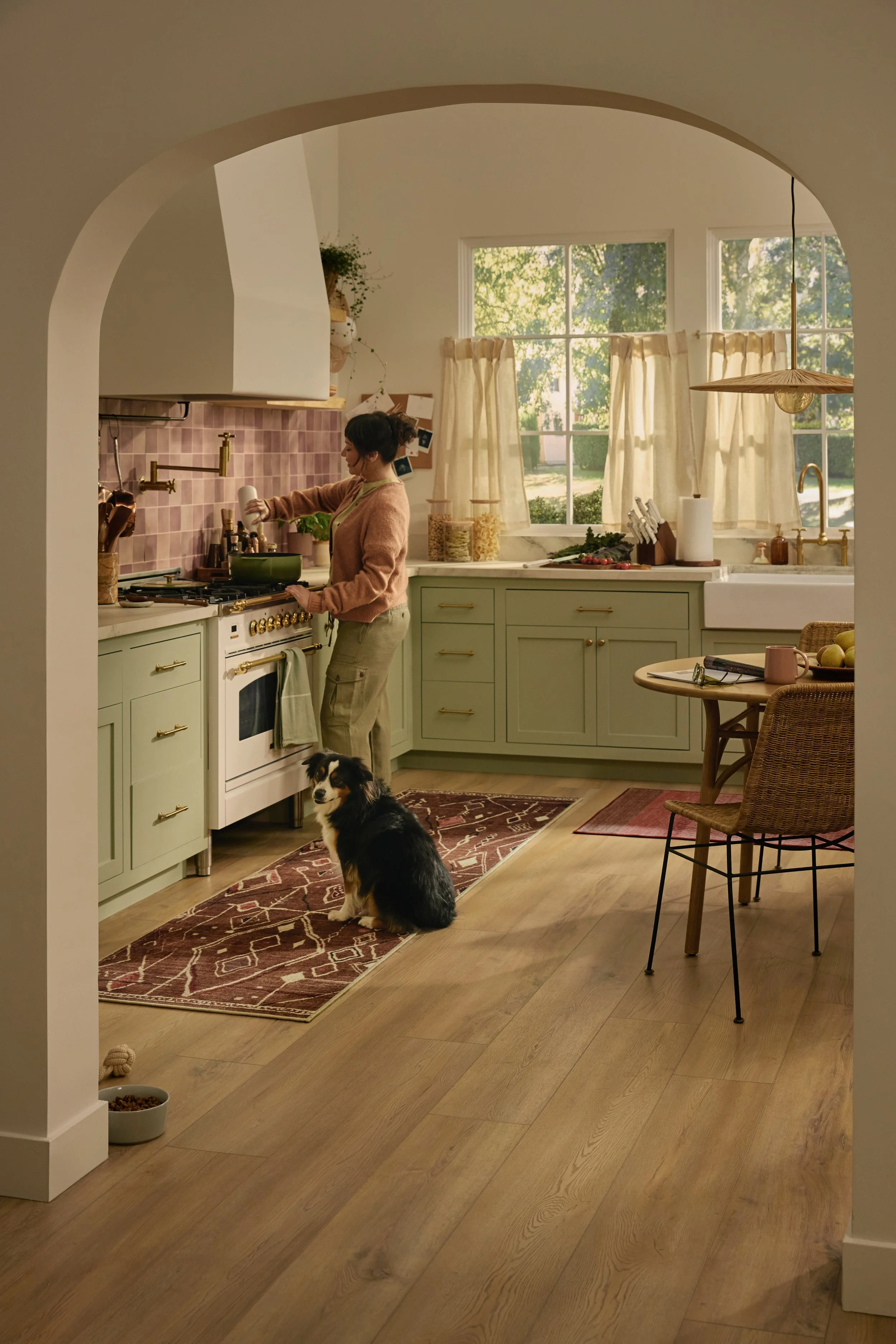 251209BOHO_1421_KIT WOMAN AT STOVE_WK_V3 2.JPG