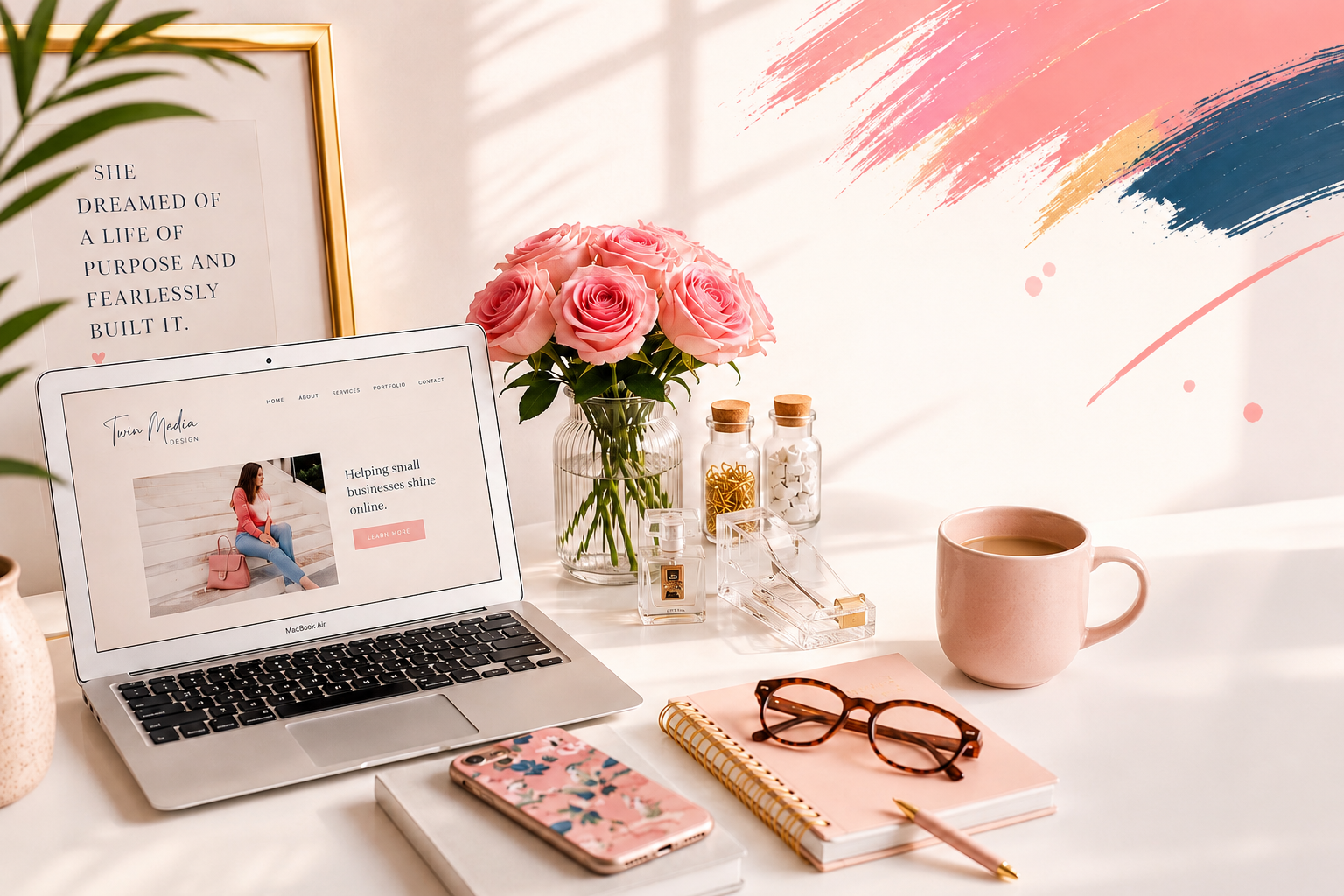 Desk with flowers and laptop