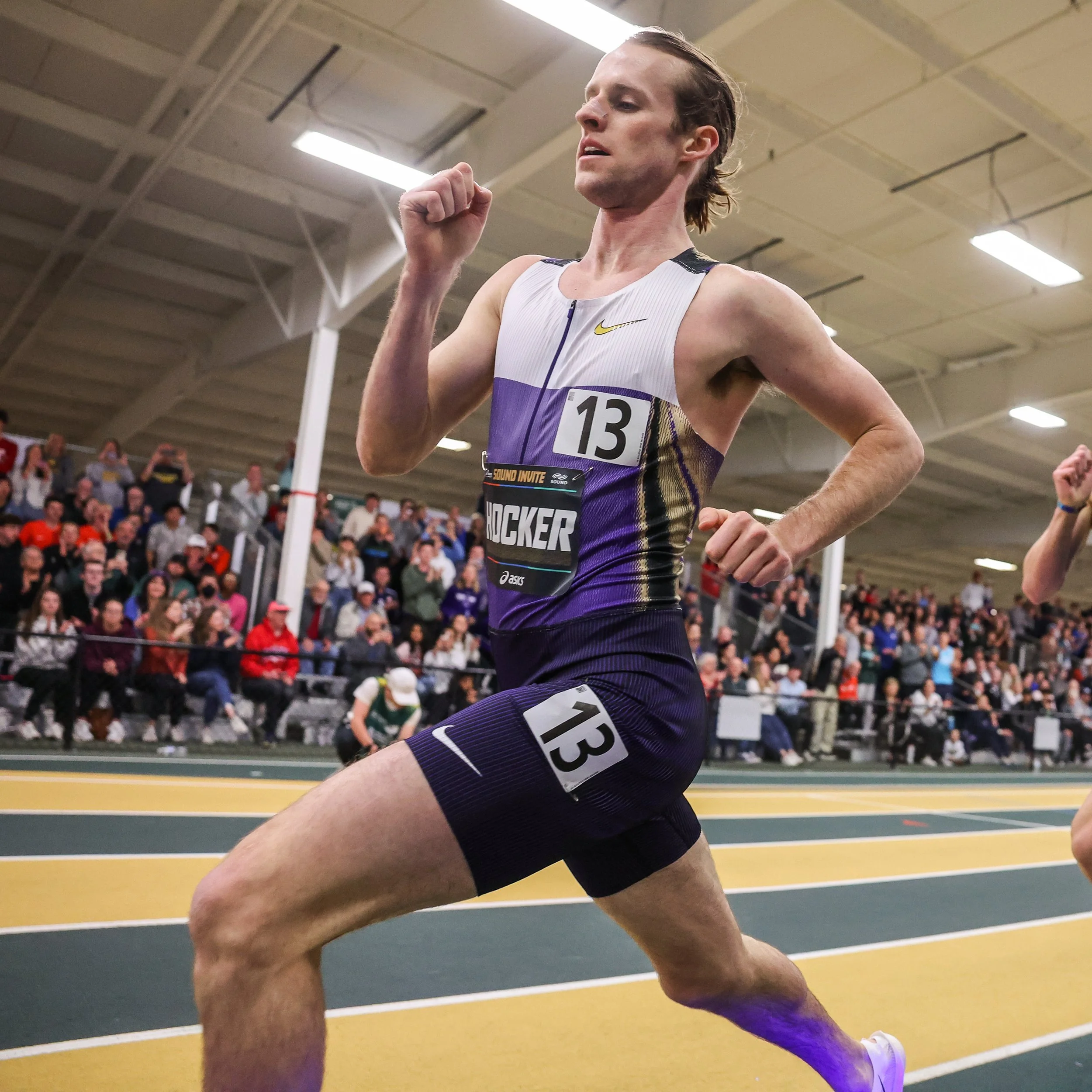 Racer celebrating at the ASICS Sound Invite