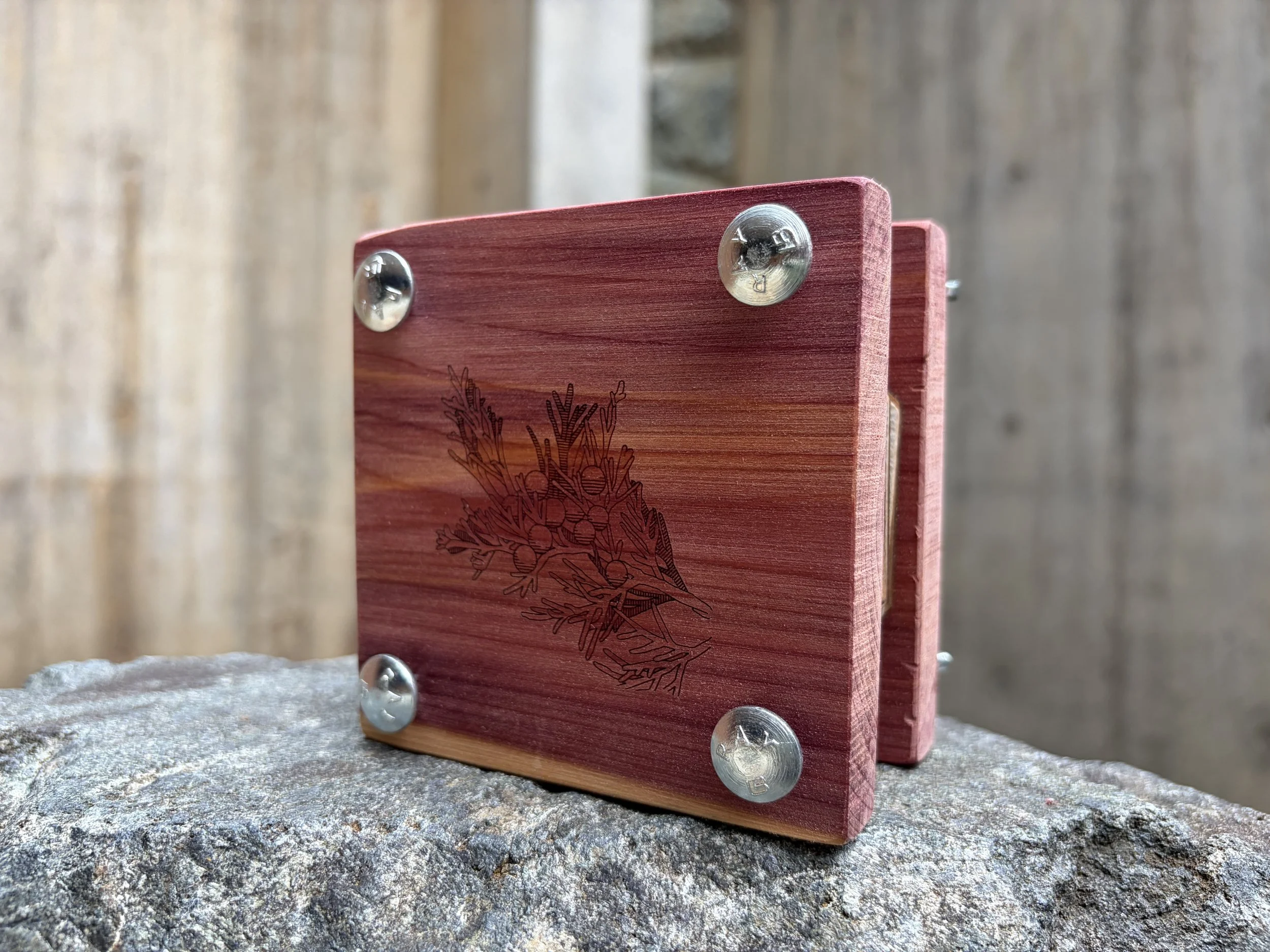 red cedar flower press with a laser engraved front and 4 carriage bolts