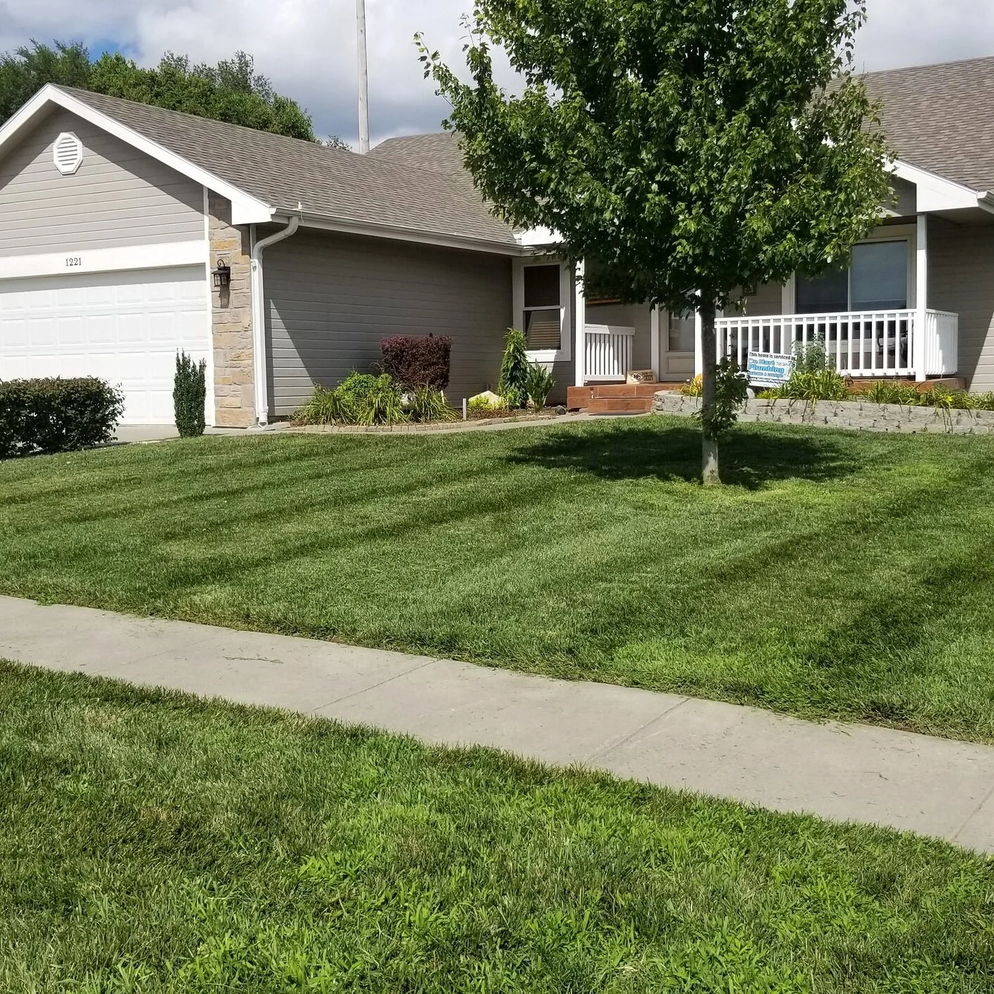 Residential lawn mowing and maintenance completed by LawnMasters in Junction City, Kansas