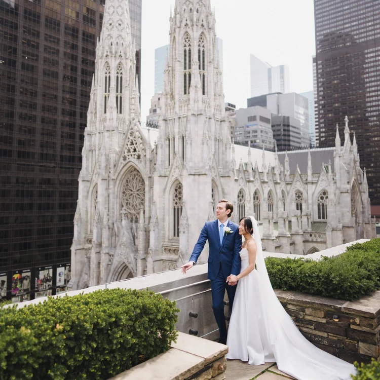 Couple walking past the spires of St. Patrick's Cathedral