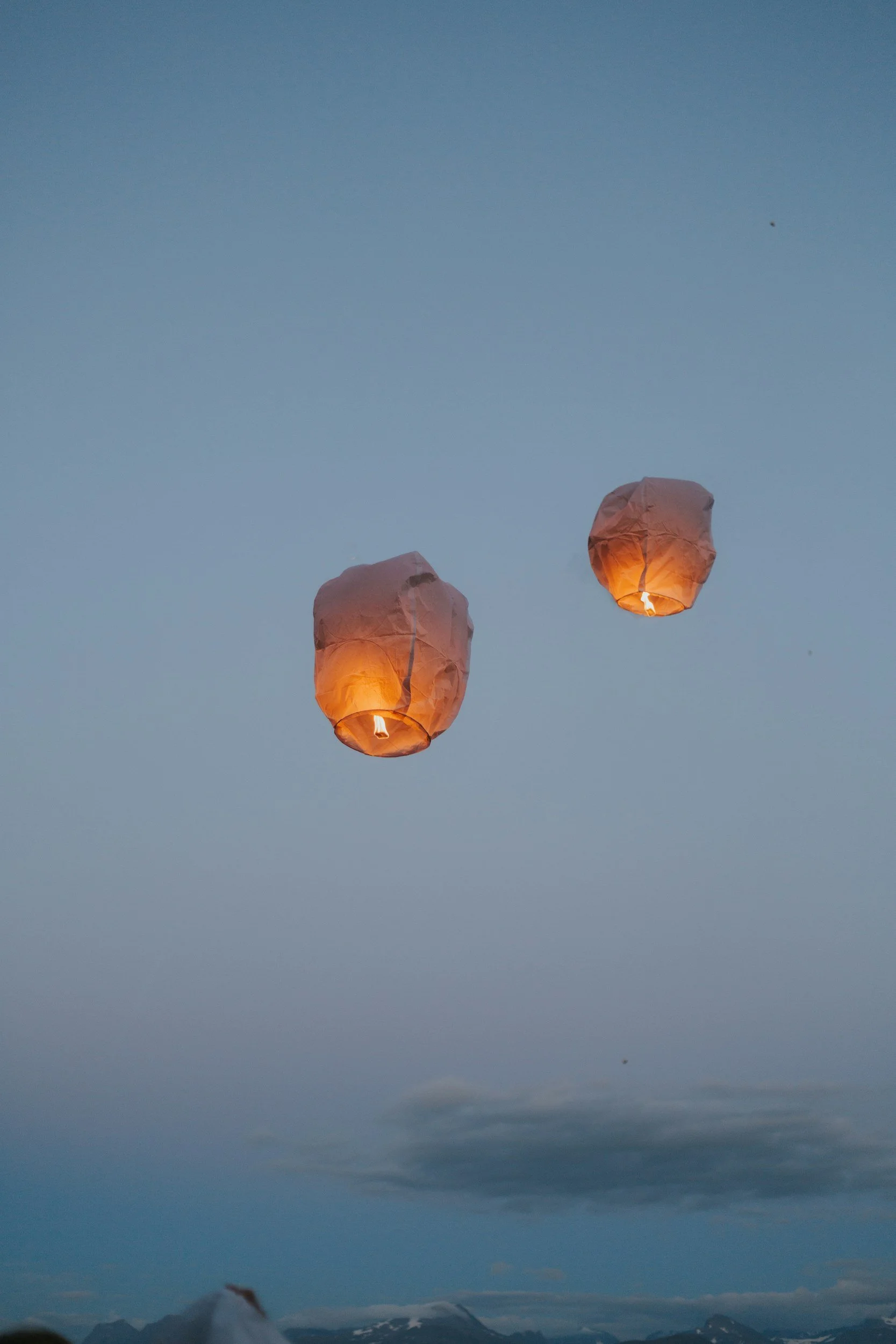 Two lanterns in the sky
