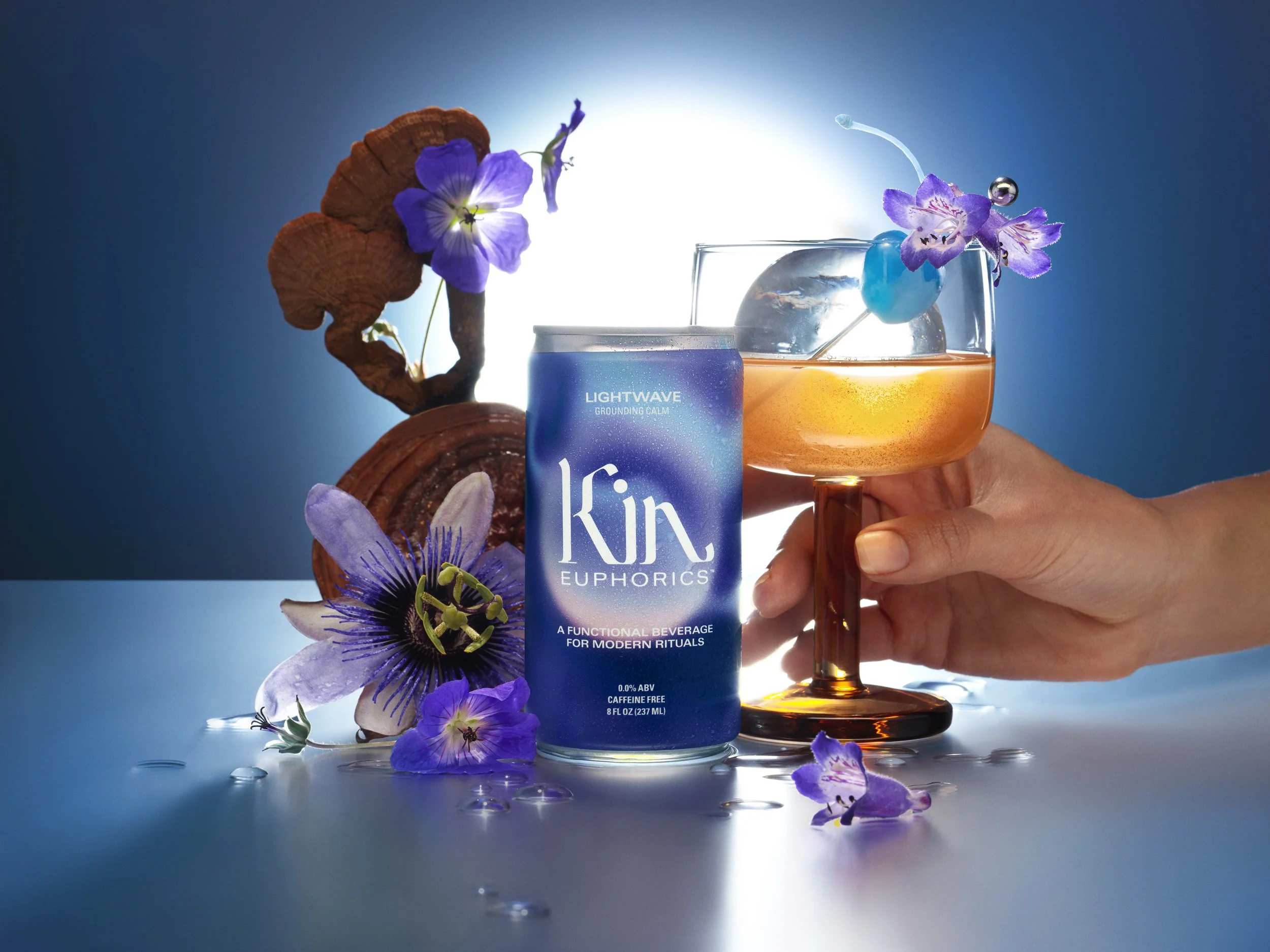 KIN D2D LIGHTWAVE DRINK W HAND_WEB.jpg