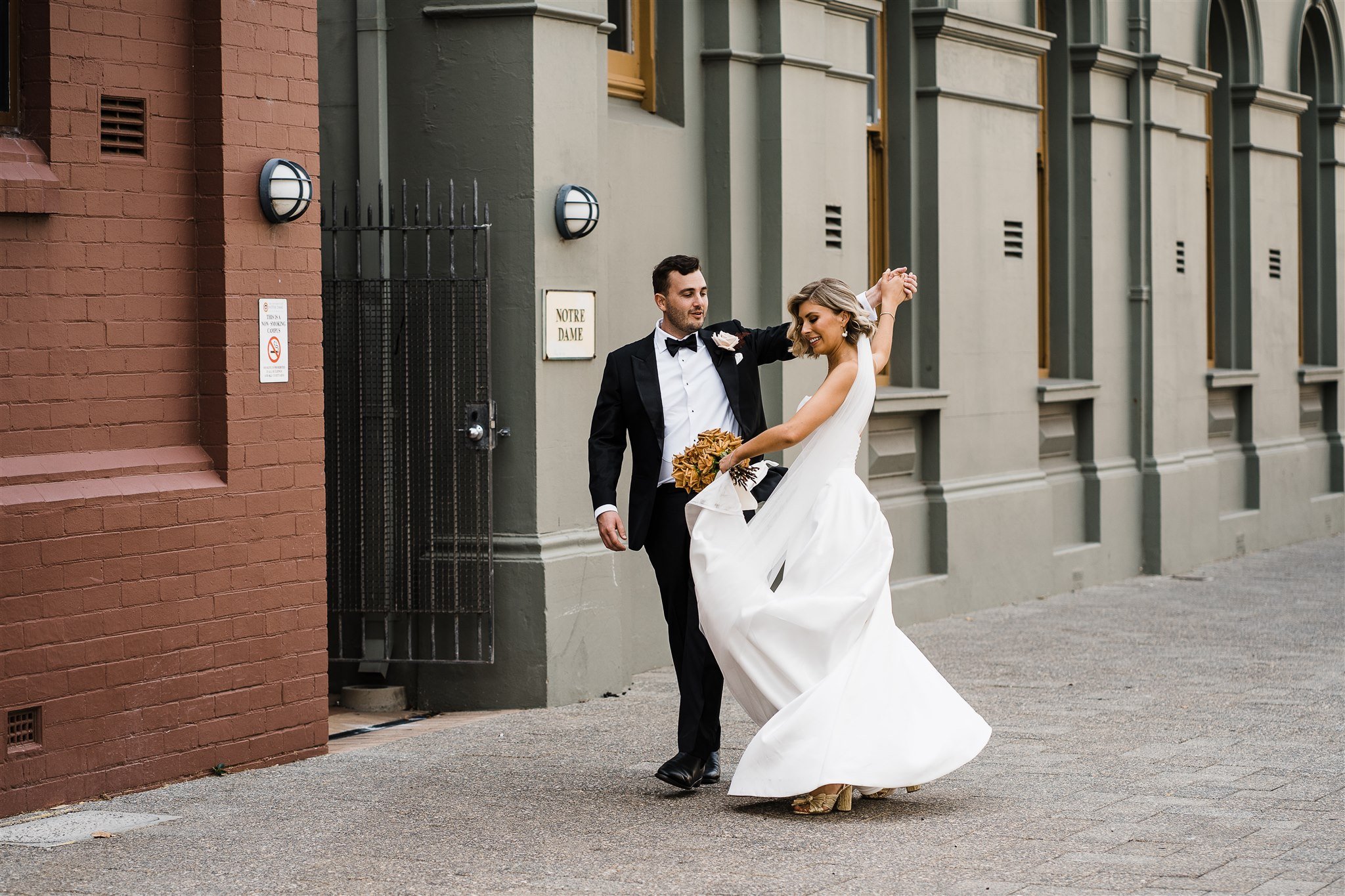  couples happy on the street outside the Assembly Yard in Fermantle Australia 