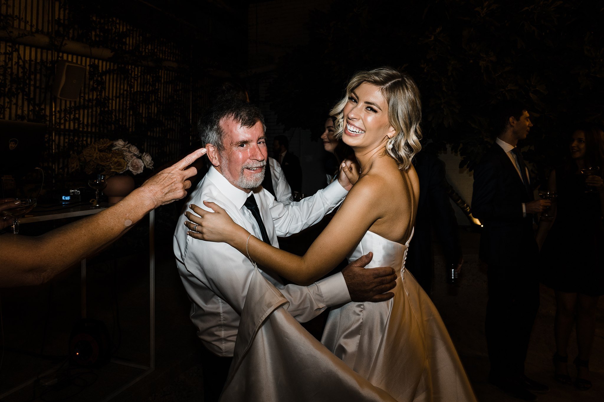  bride is happy dancing with her father in the after party of their wedding held in Assembly Yard in Fermantle Australia 
