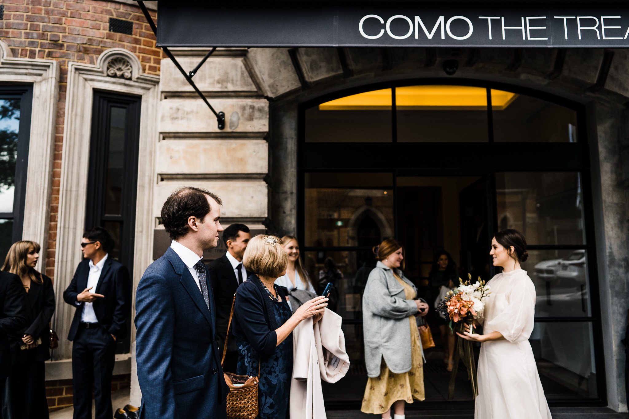  guests outside the COMO the Treasury  