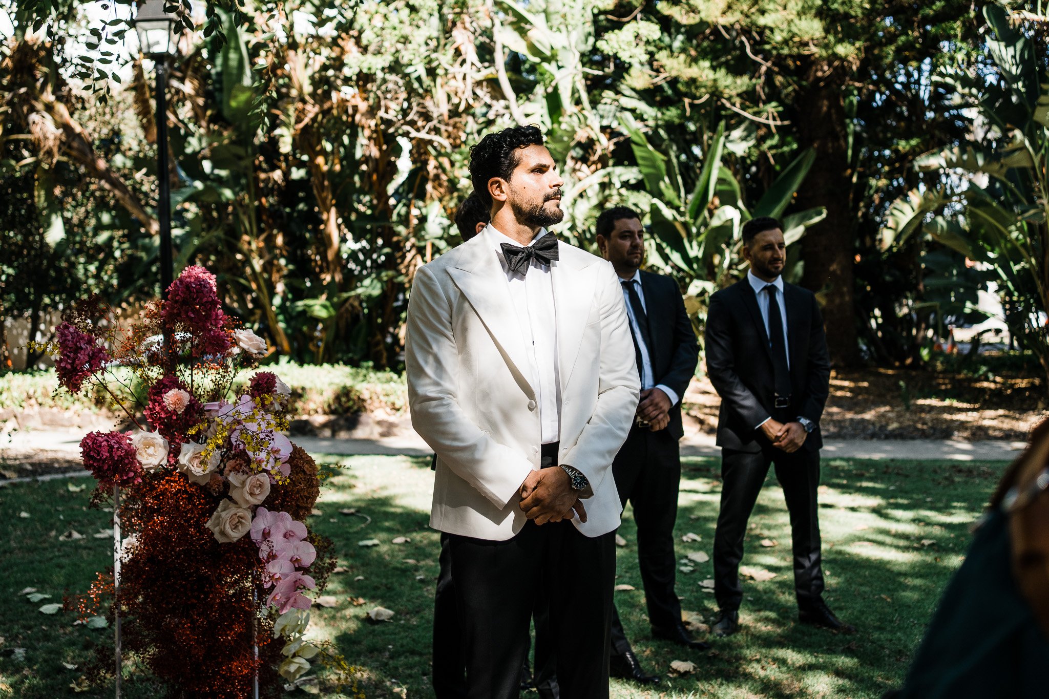  the groom waits for her bride in the altar 