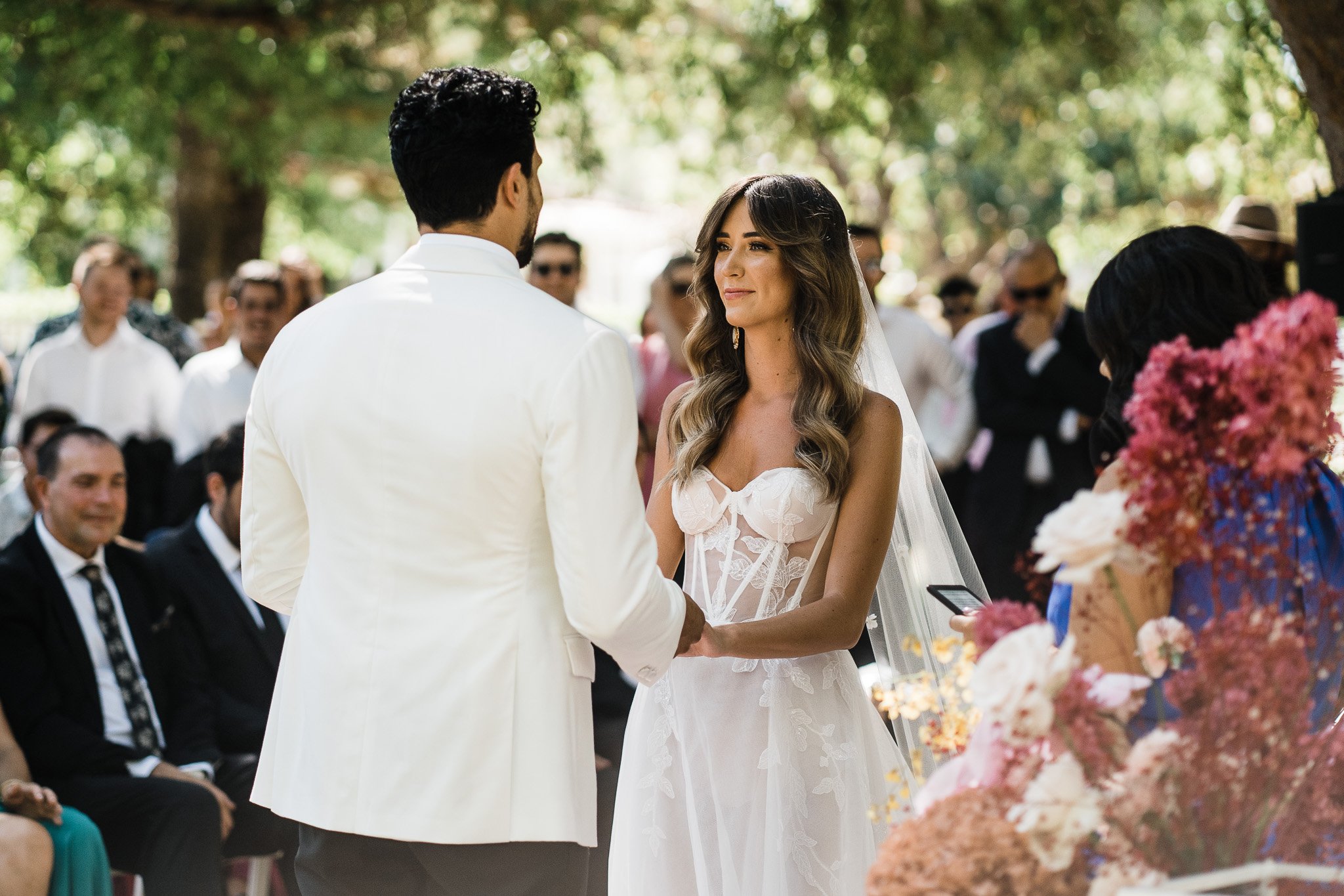  the couple saying their vows to each other 