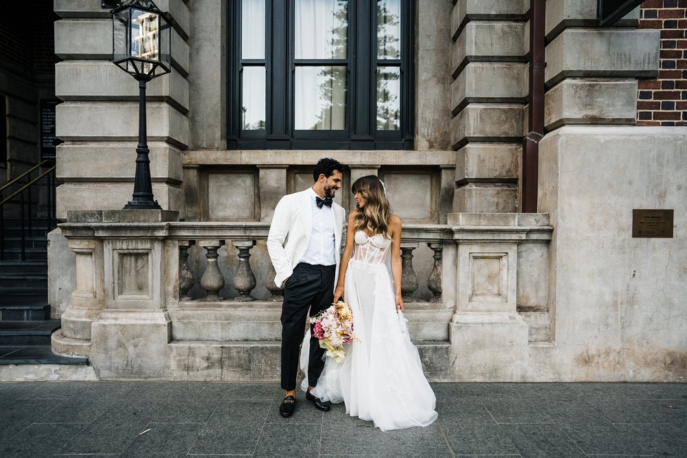  bride and groom looking at each other for their wedding portrait in COMO the Treasury in Perth, Australia 