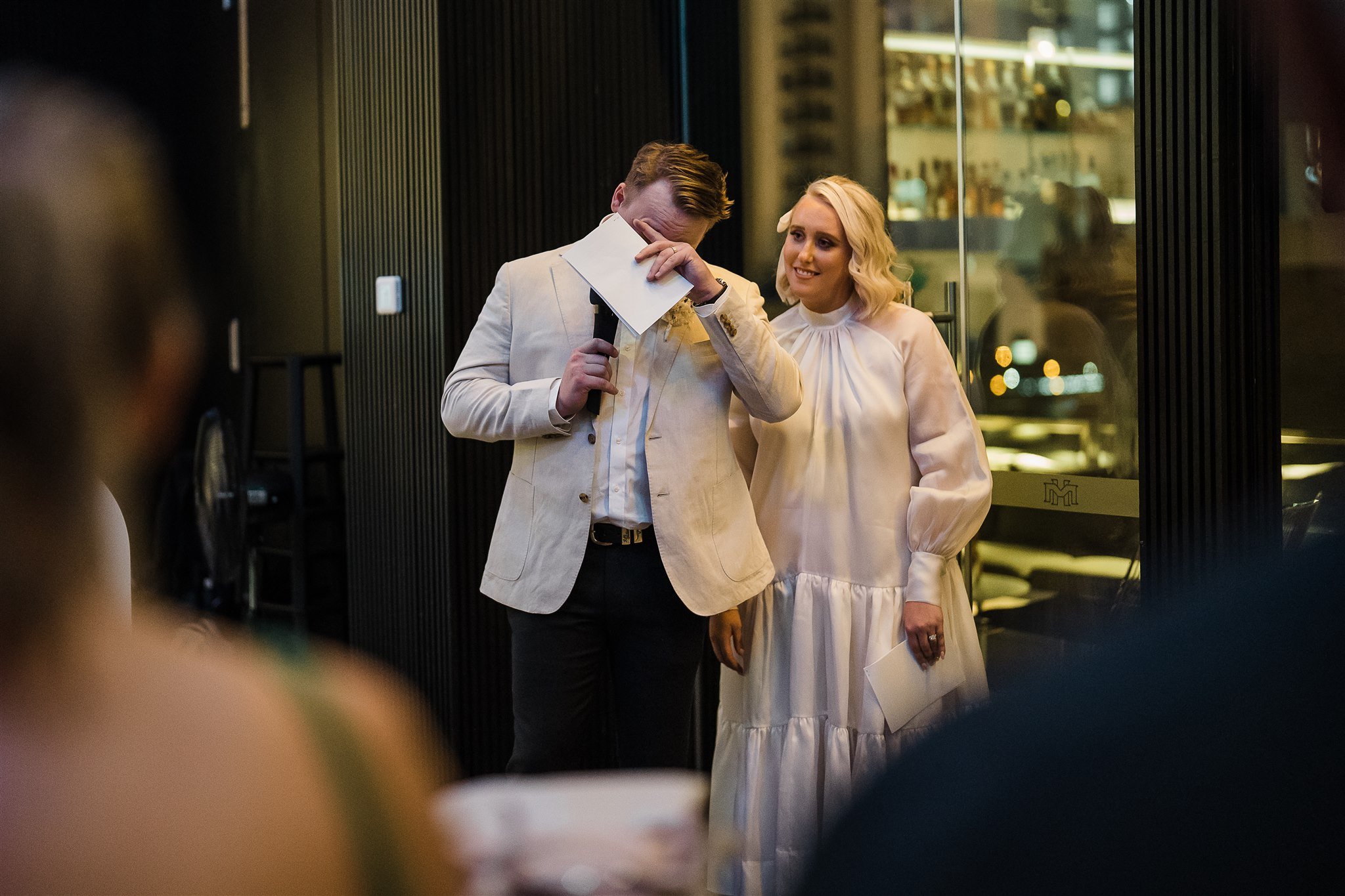  the groom is teary eyed when making his speech on their wedding reception  