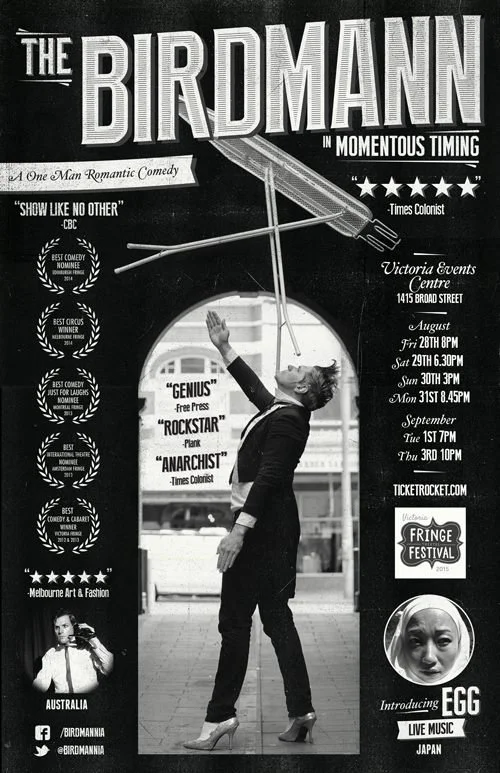Black and white poster for The Birdmann in Momentous Timing comedy show at Victoria Events Centre. Features a man in a suit and heels balancing a flying umbrella with a person dangling upside down. Includes show dates, location, and social media info