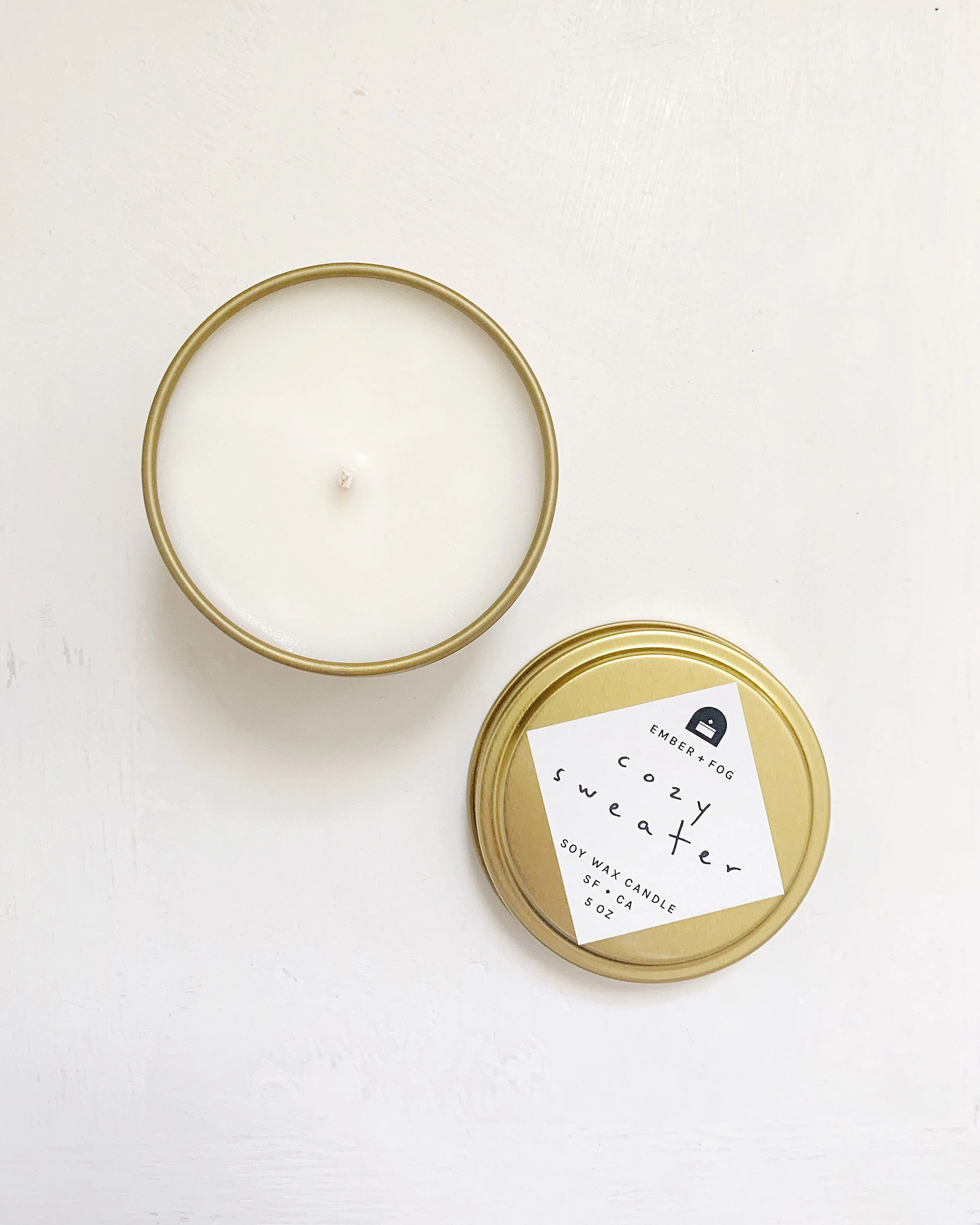 single-candle-overhead-lid-off-on-white-ember-and-fog-handmade-scented-holiday-fragrance-web-cozy-sweater.jpg