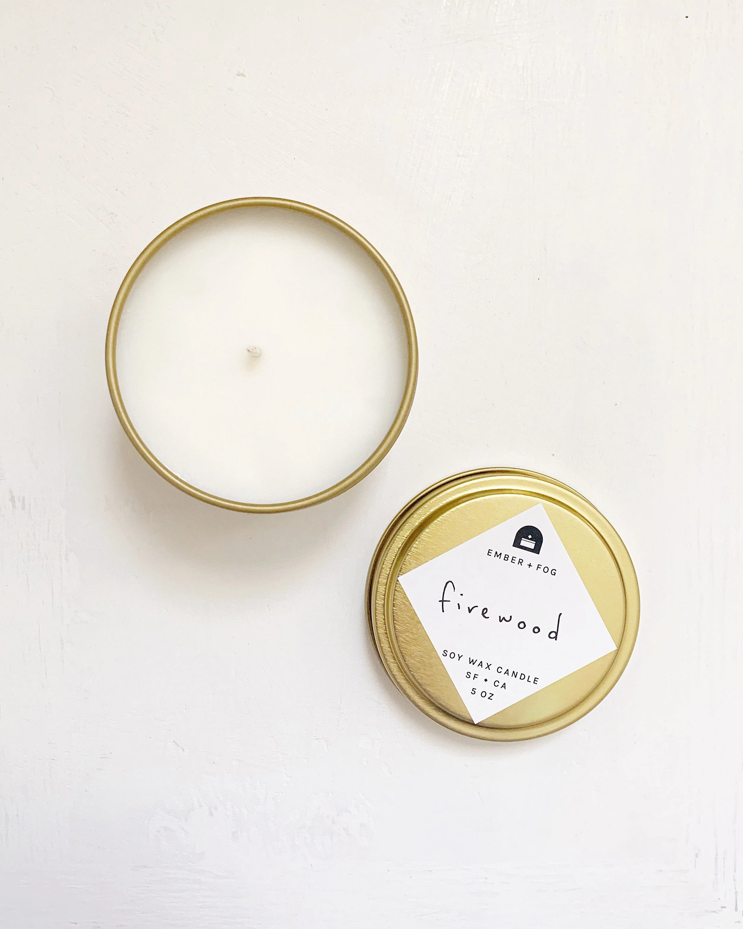single-candle-overhead-lid-off-on-white-ember-and-fog-handmade-scented-holiday-fragrance-web-firewood.jpg