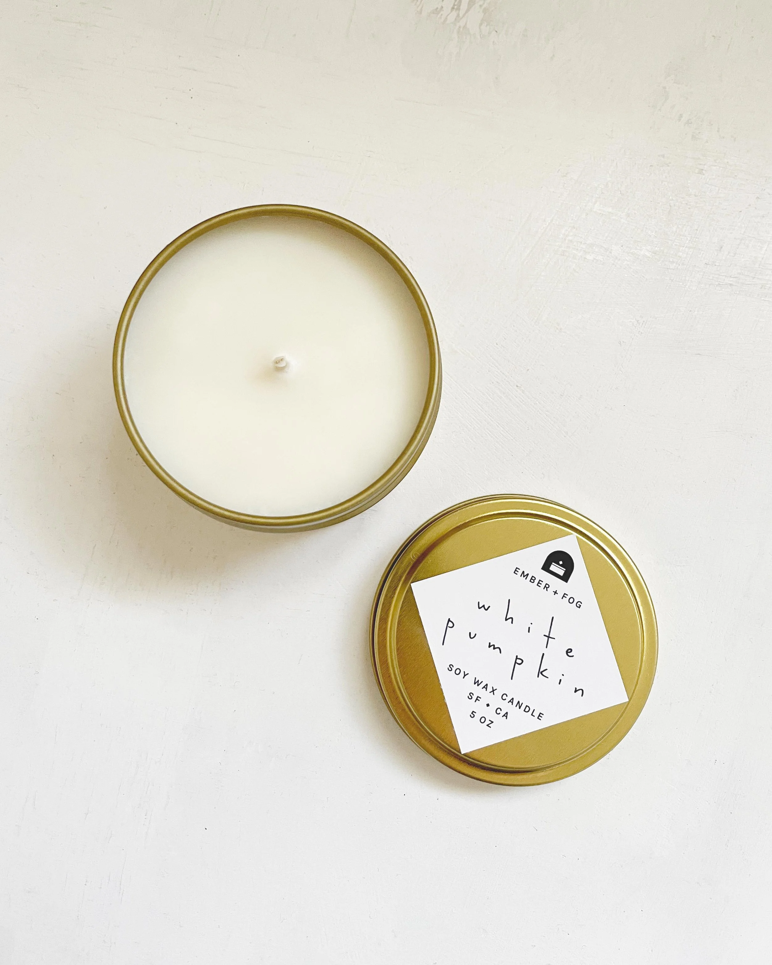 single-candle-overhead-lid-off-on-white-ember-and-fog-handmade-scented-autumn-white-pumpkin.jpg