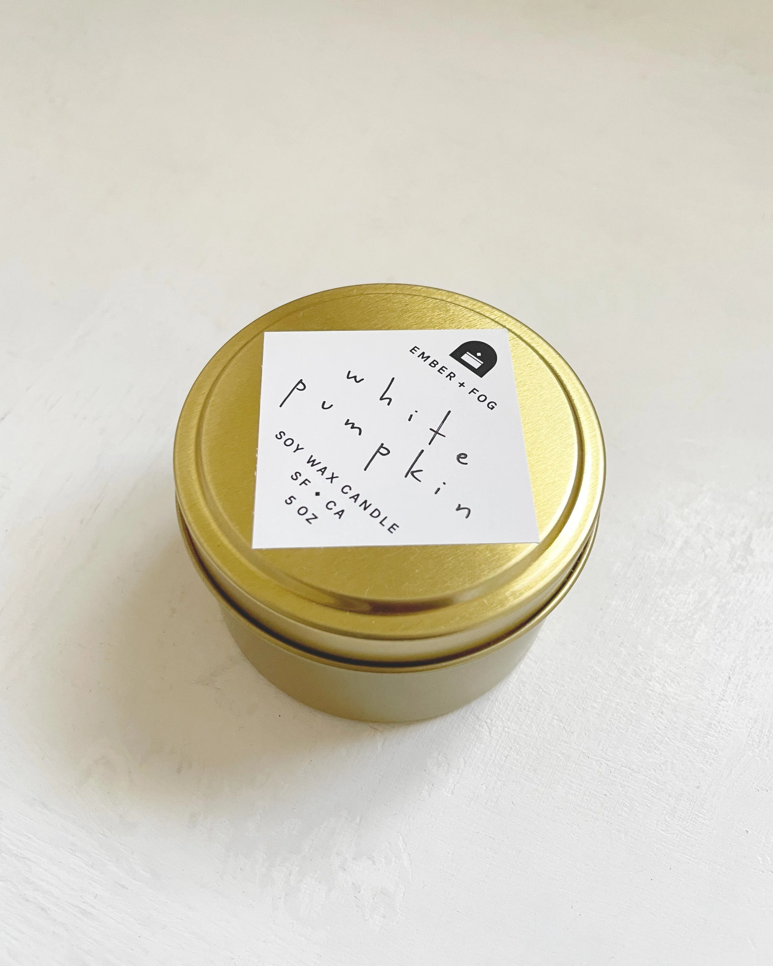 single-candle-angle-on-white-ember-and-fog-handmade-scented-autumn-white-pumpkin.jpg