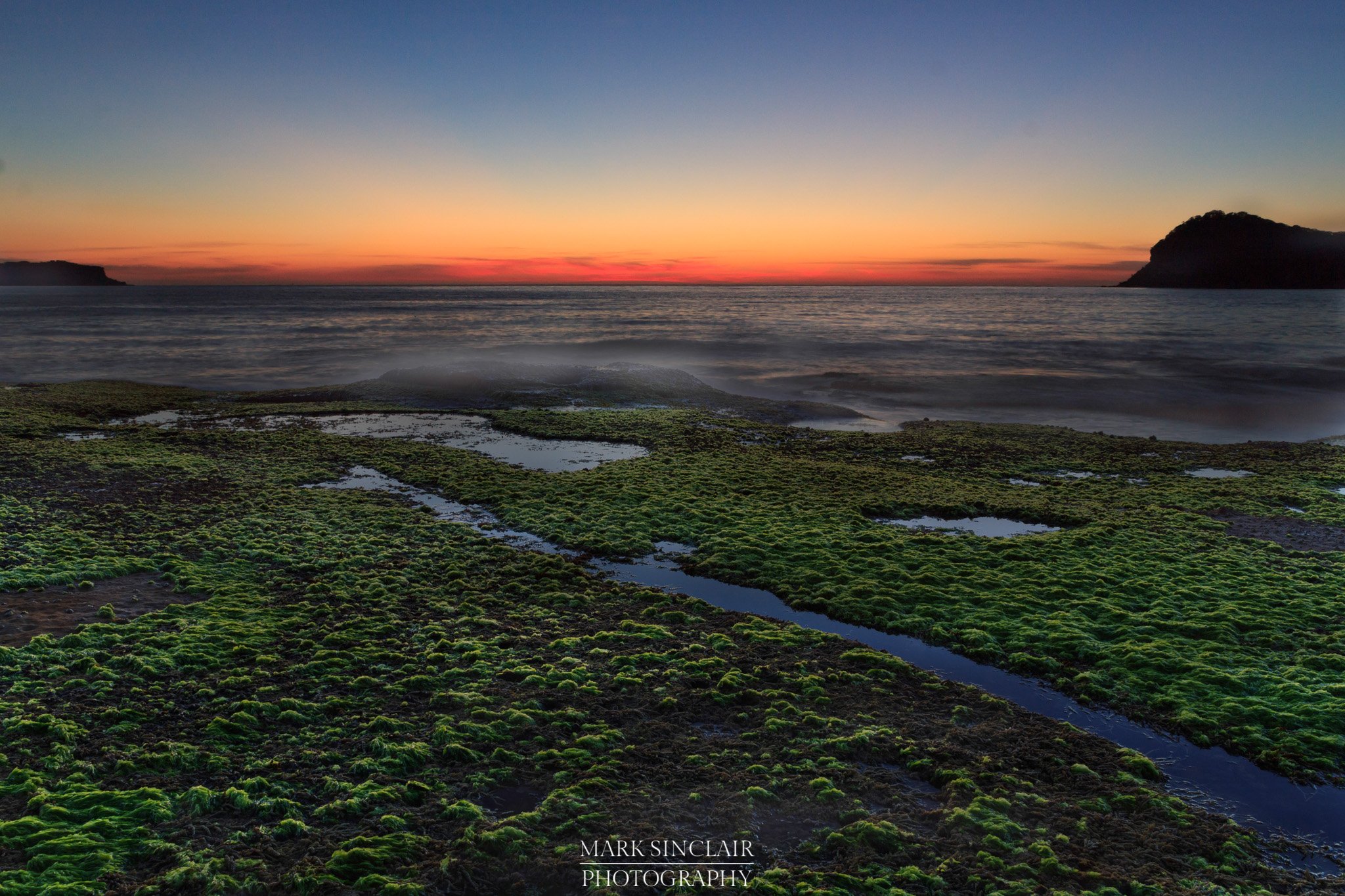   The glow before sunrise looking out to the ocean  