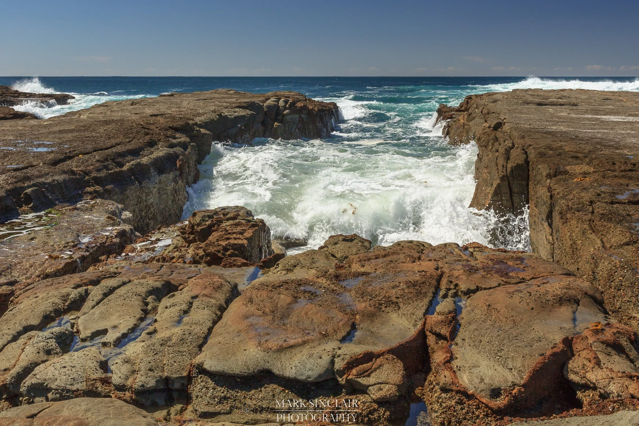   The rocks underneath the lighthouse  