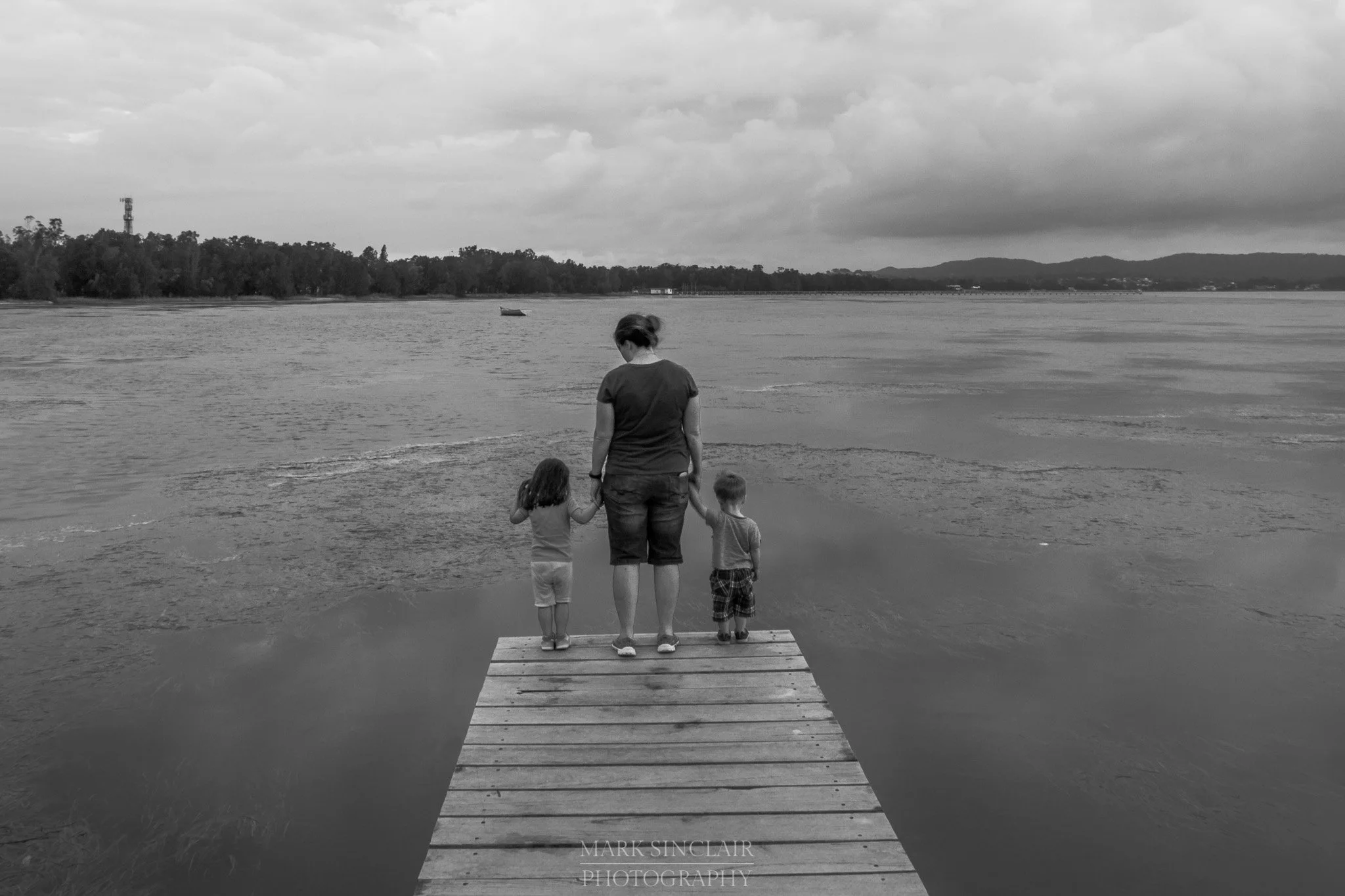   My wife, Tash, and the kids looking out over the water  