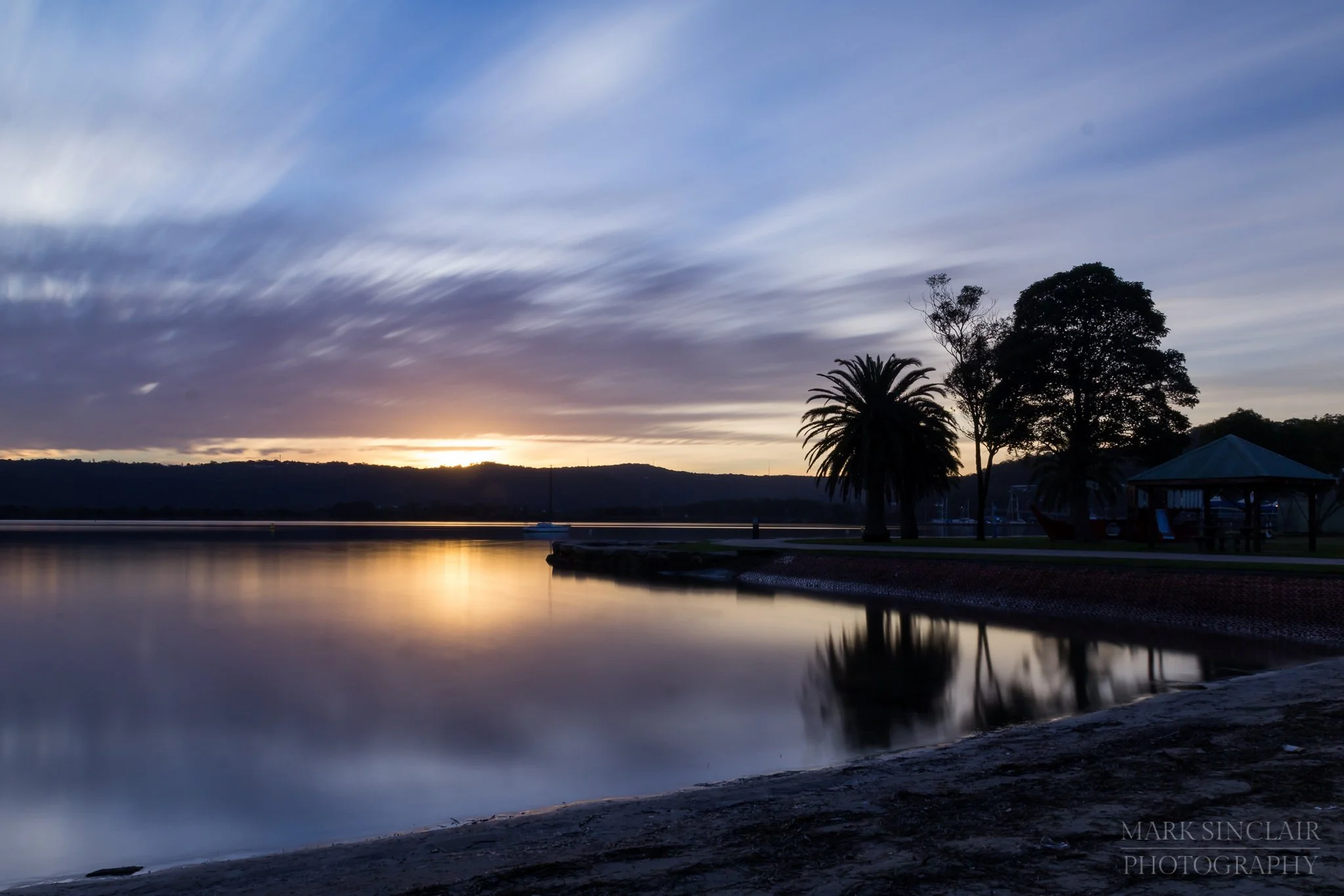   Cool tones of a winter sunset waiting to burst into colour  