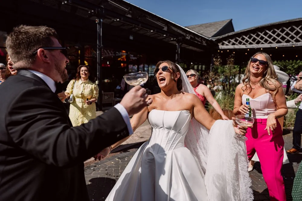 Bride and groom dancing in the sunshine on their wedding dat at The Bond in Digbeth