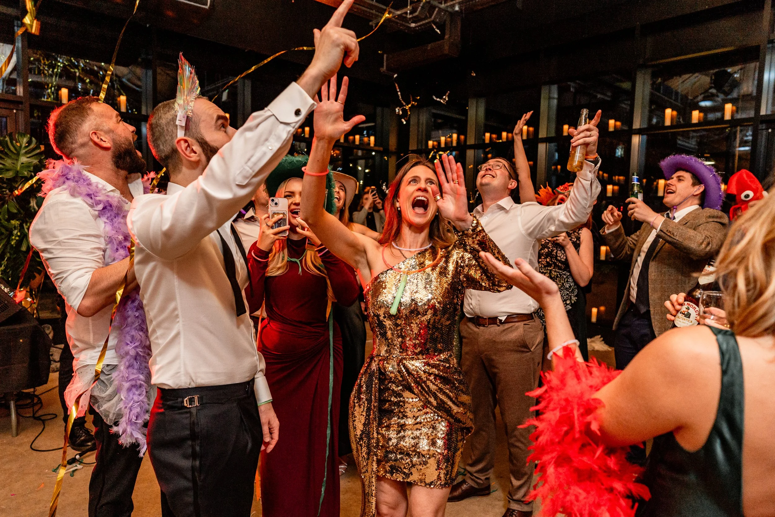 Wedding party celebrating on the dance floor on this non traditional wedding day
