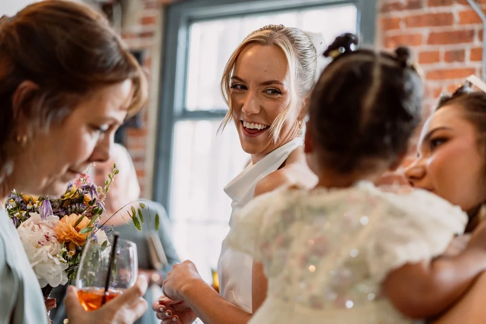candid photo of bride during wedding reception at Chapter Hall in Leeds