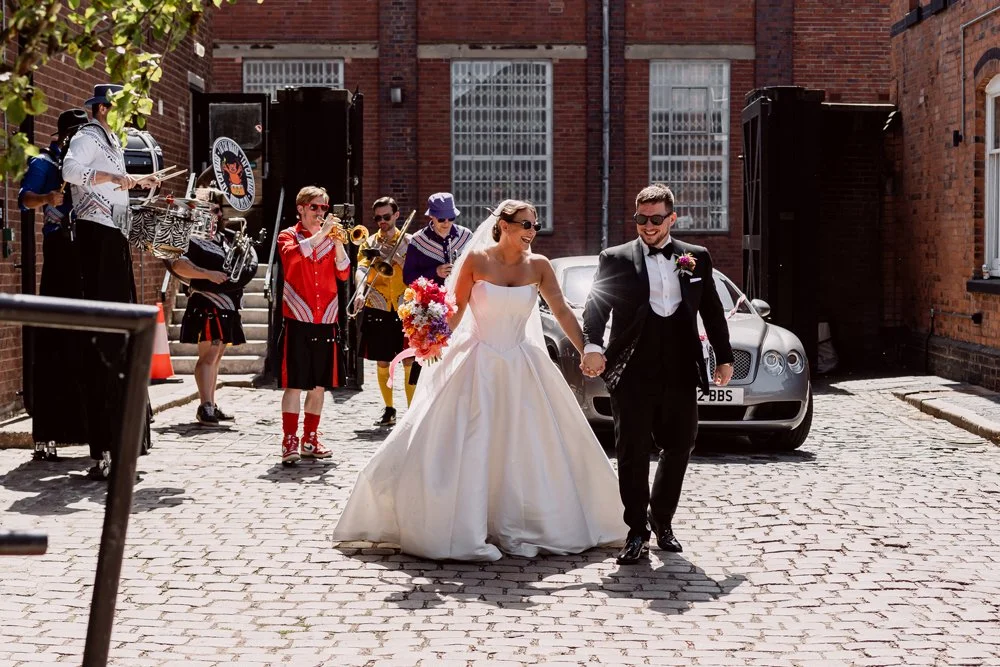 Bride and groom making their entrance at The Bond in Digbeth