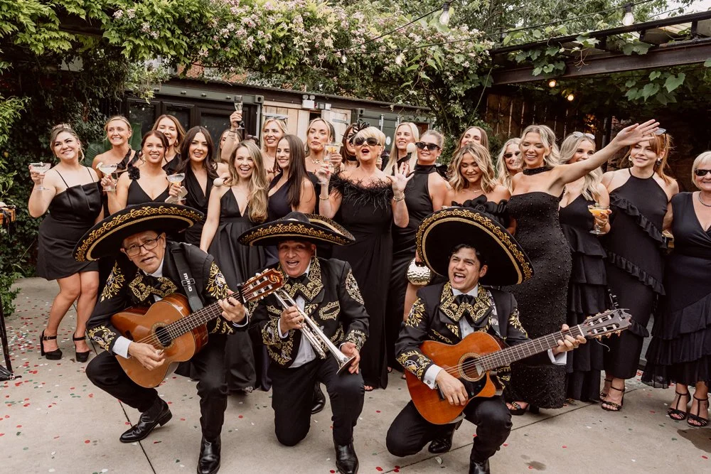 guests with mariachi band as alternative entertainment on wedding day