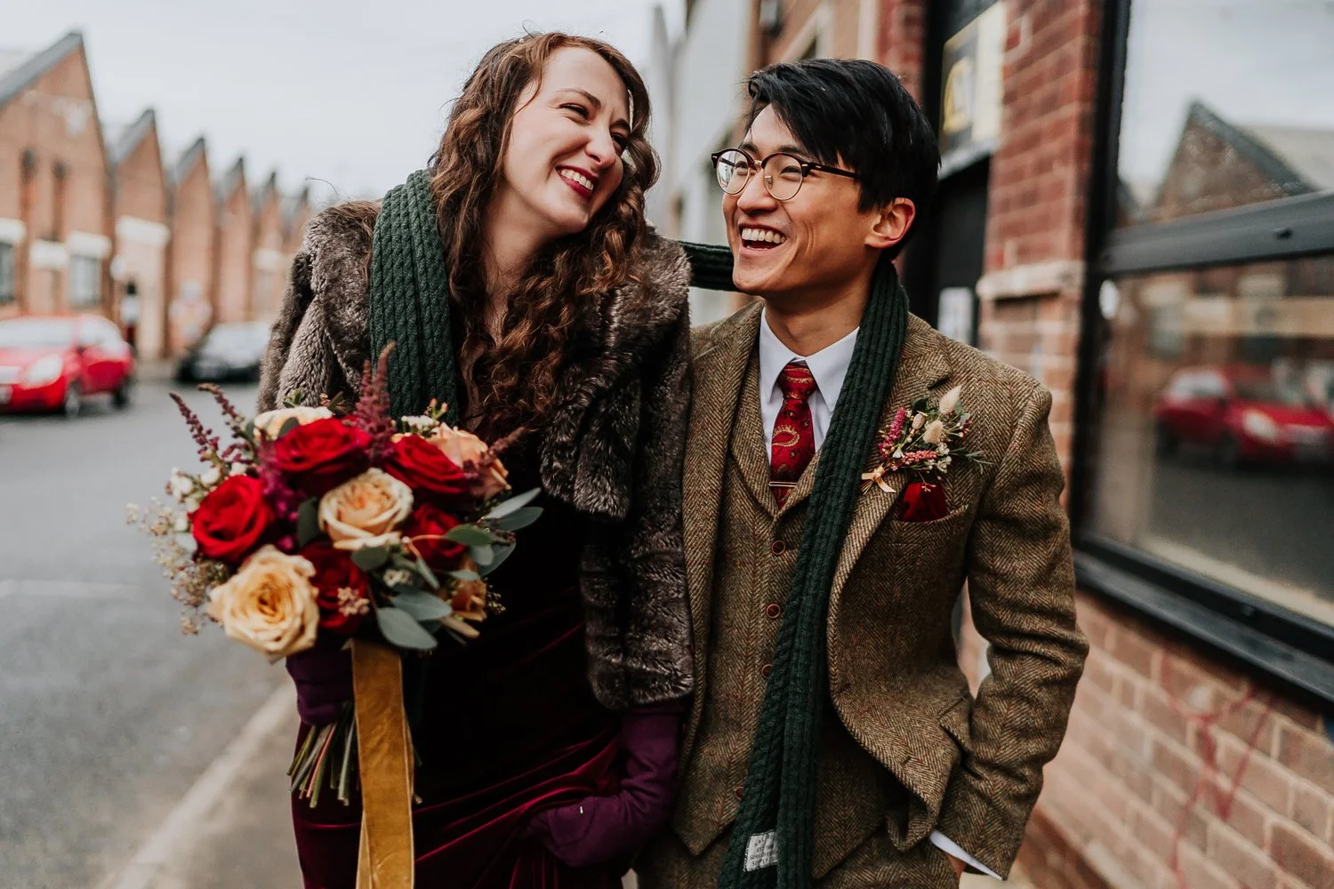 Couple walking through urban streets of Birmingham
